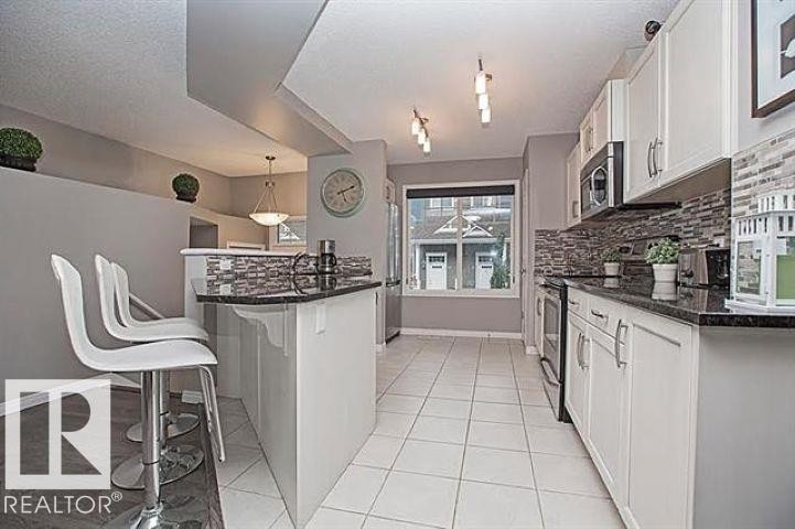 #95 4050 Savaryn Dr Sw, Edmonton, AB - Indoor Photo Showing Kitchen