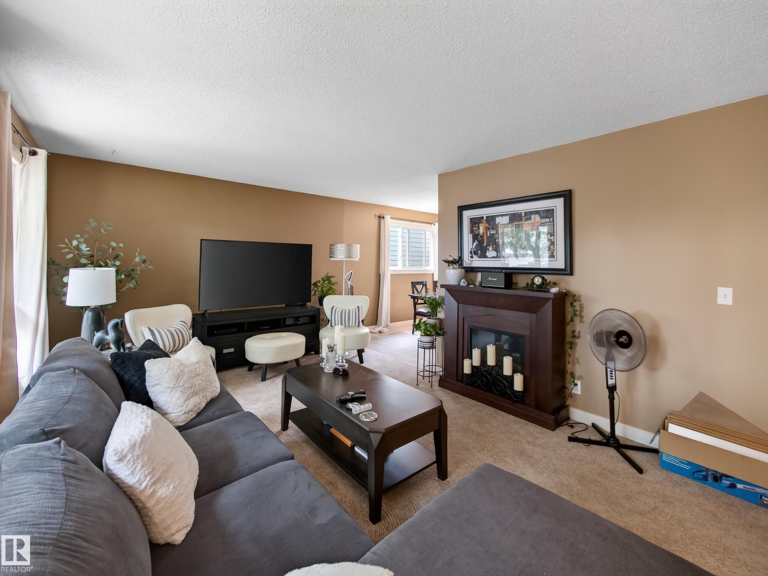 10136 81 Street Nw, Edmonton, AB - Indoor Photo Showing Living Room With Fireplace