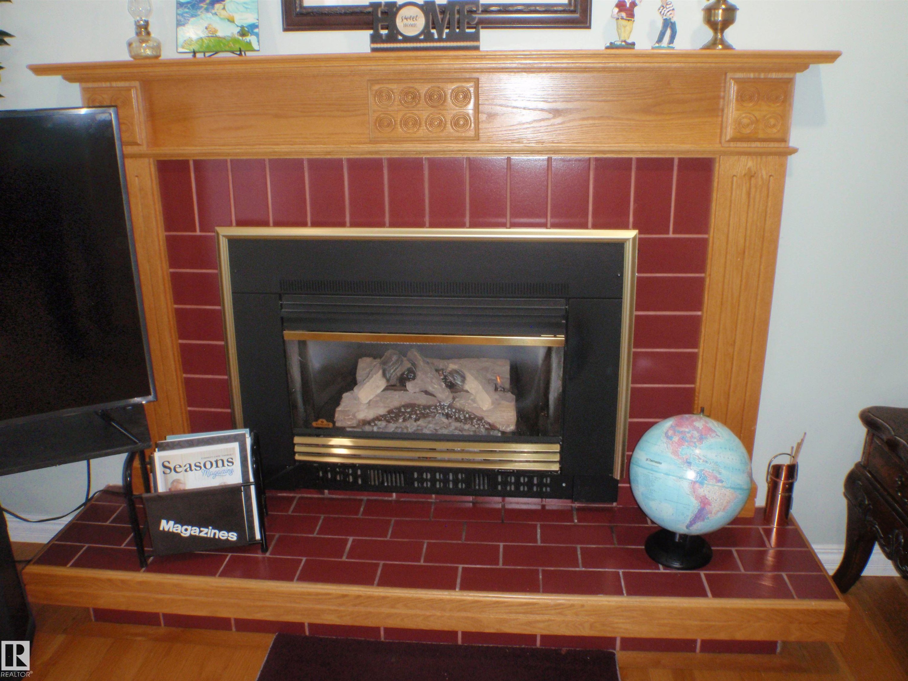 5802 53 Street, Barrhead, AB - Indoor Photo Showing Living Room With Fireplace