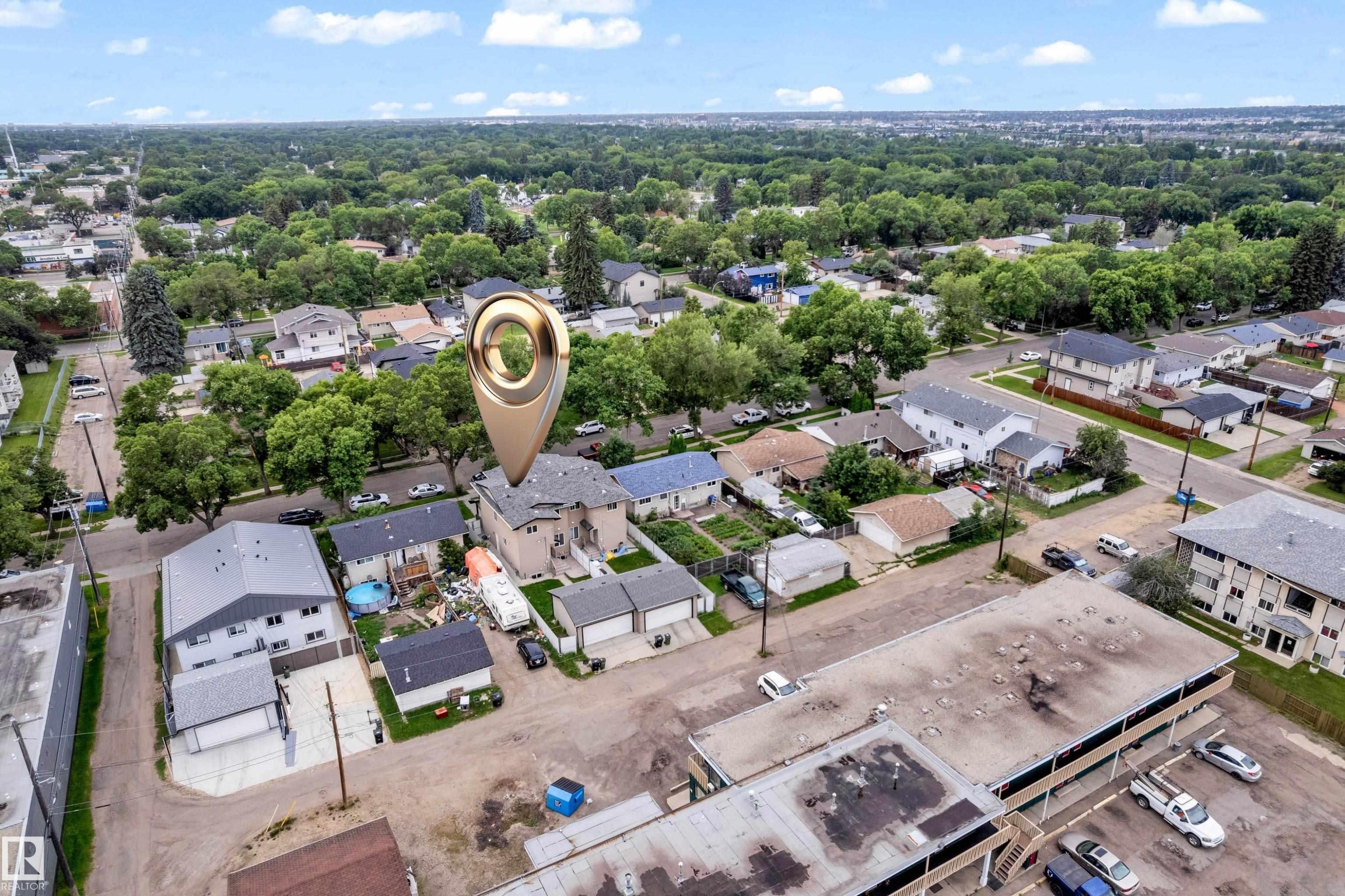 Residential neighborhood with mature trees and a mix of single-family homes and multi-story buildings - 11817 37 Street Nw, Edmonton, AB - Outdoor With View