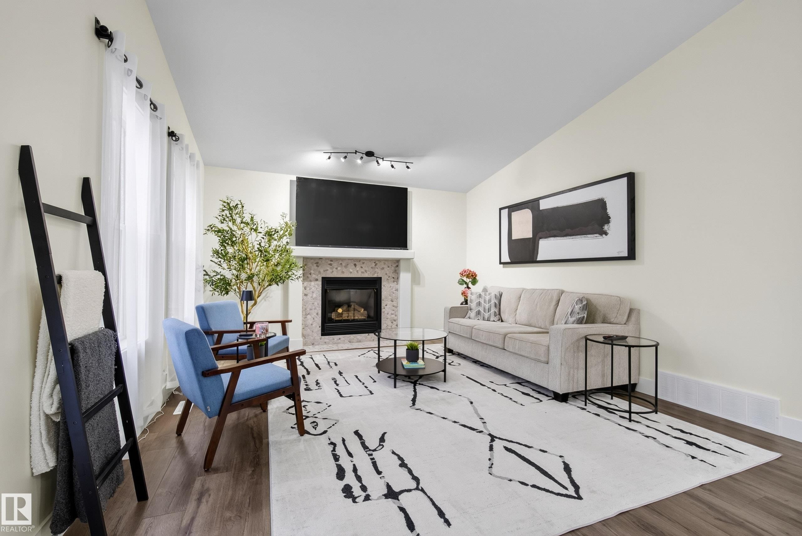 6741 162A Avenue Nw, Edmonton, AB - Indoor Photo Showing Living Room With Fireplace