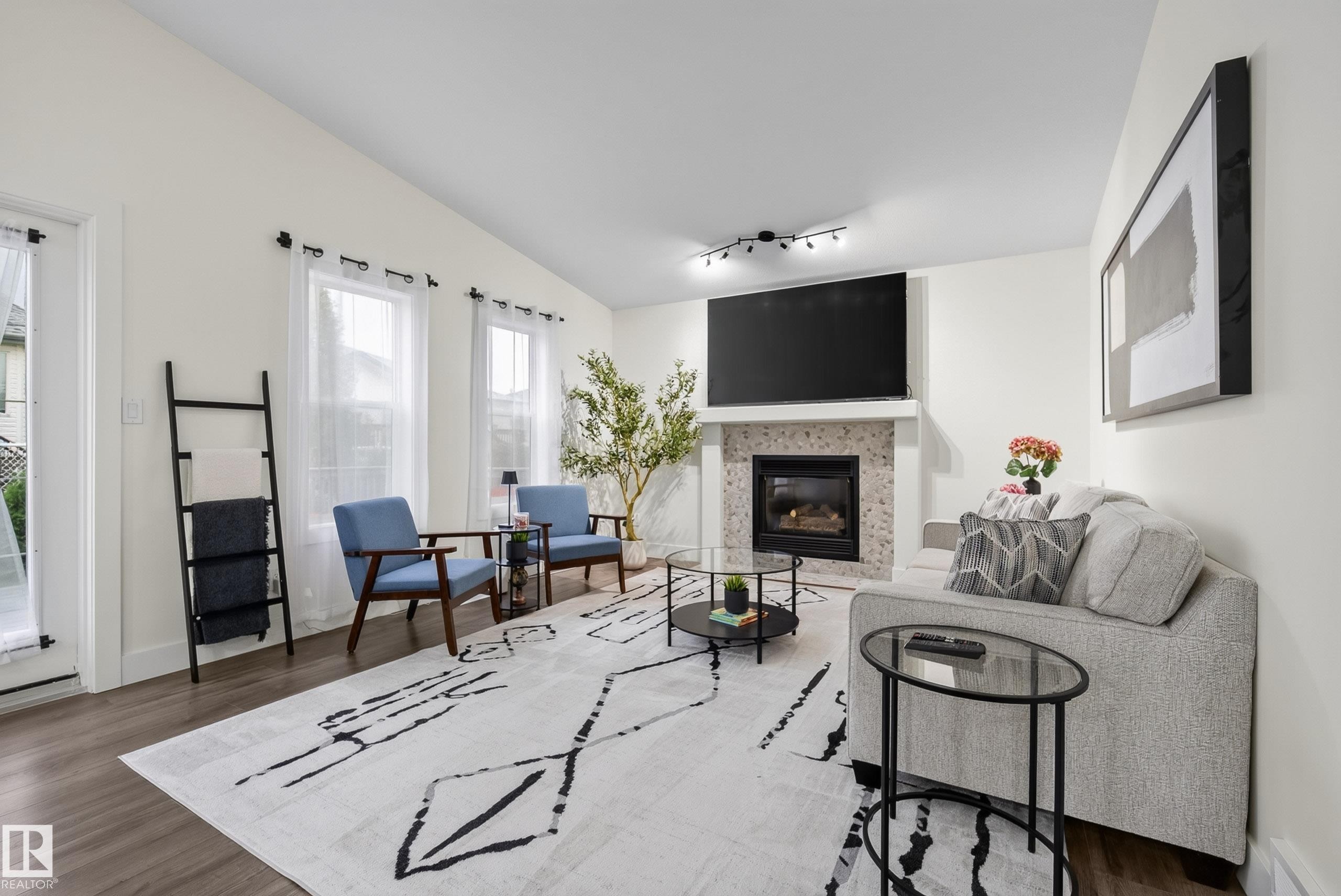 6741 162A Avenue Nw, Edmonton, AB - Indoor Photo Showing Living Room With Fireplace
