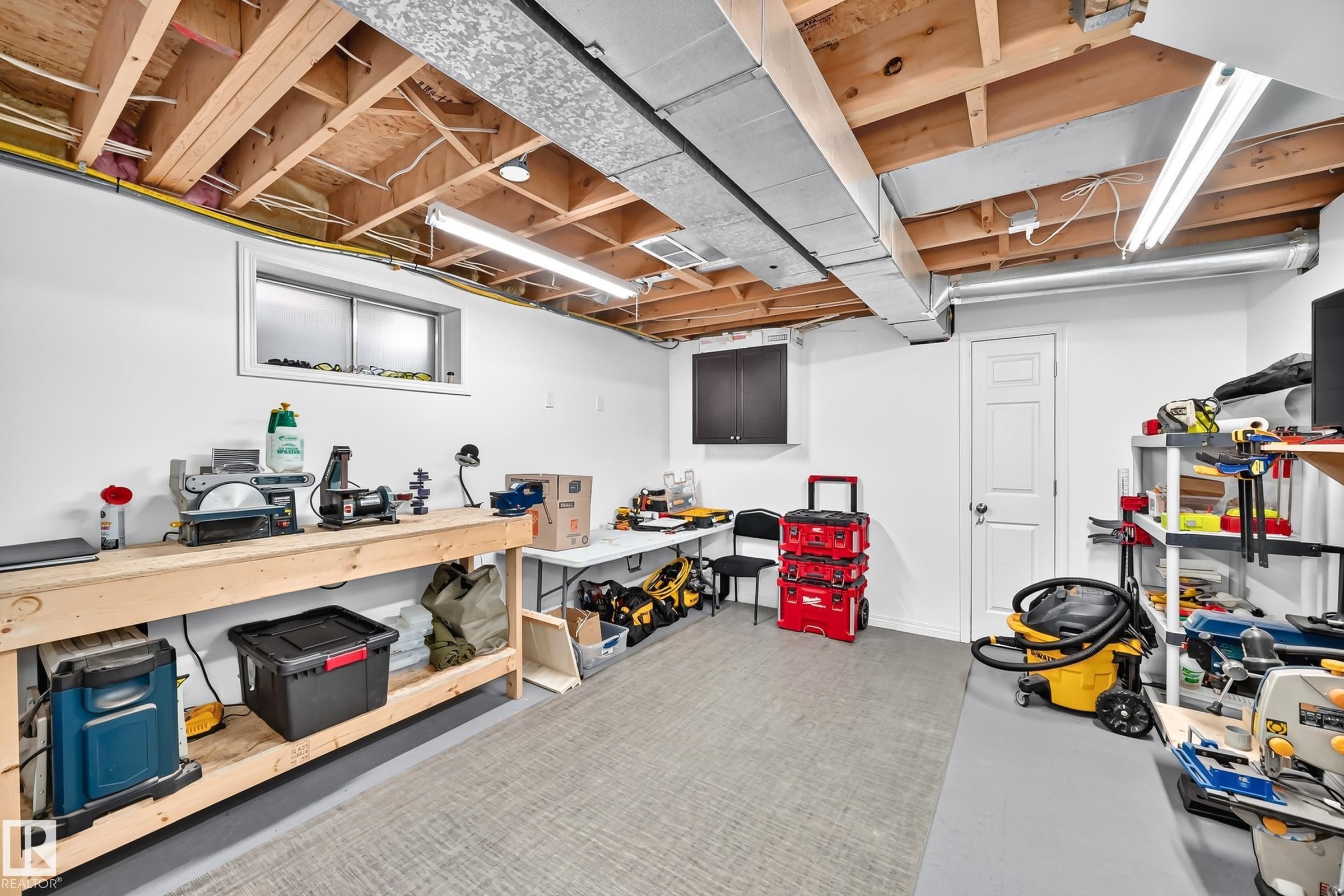 Lower level utility space with exposed wood joists and ductwork - 3729 131A Avenue Nw, Edmonton, AB - Indoor Photo Showing Basement