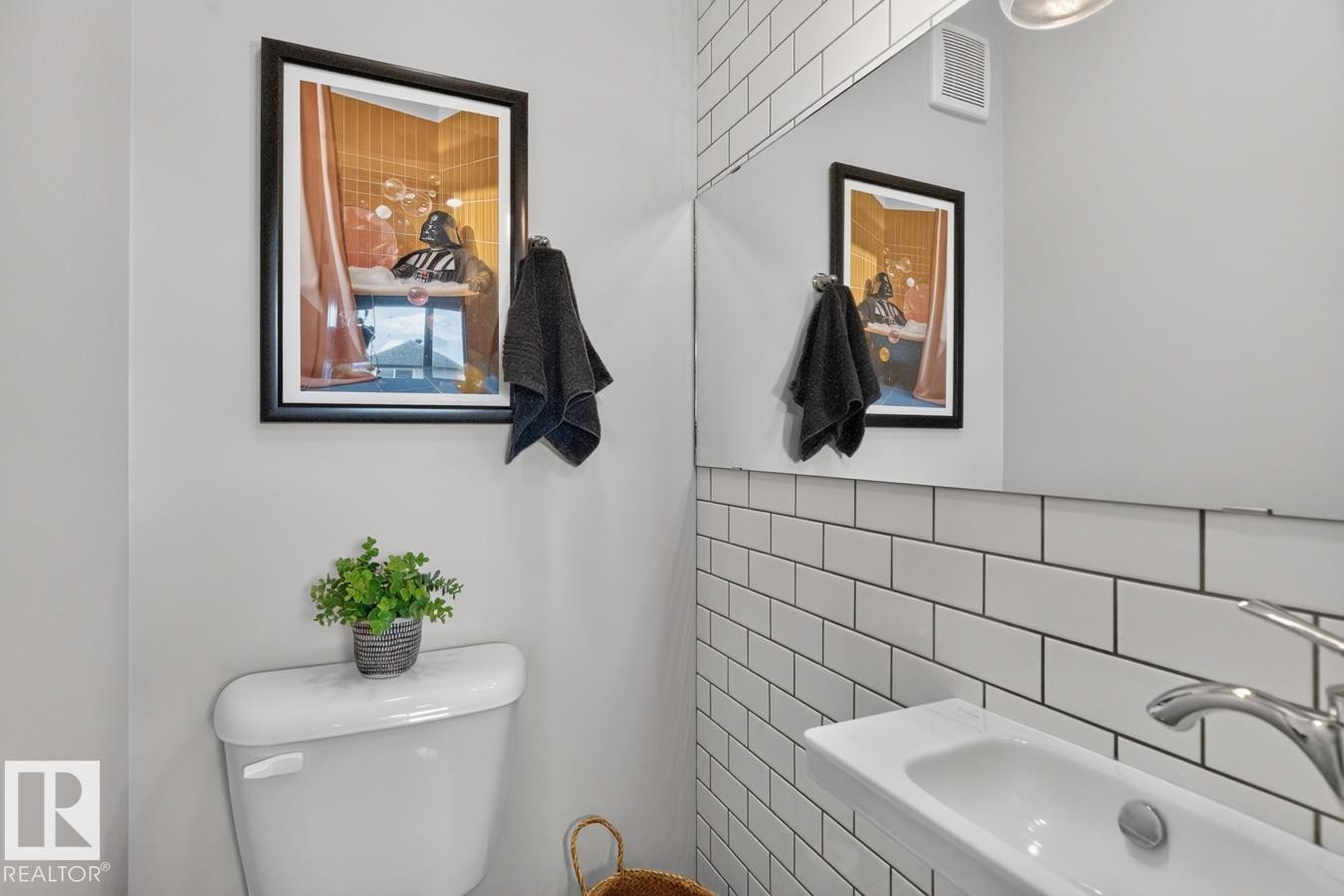 View of the Main Floor Half Bath located just off the Kitchen. - 1051 Cy Becker Road Nw, Edmonton, AB - Indoor Photo Showing Bathroom