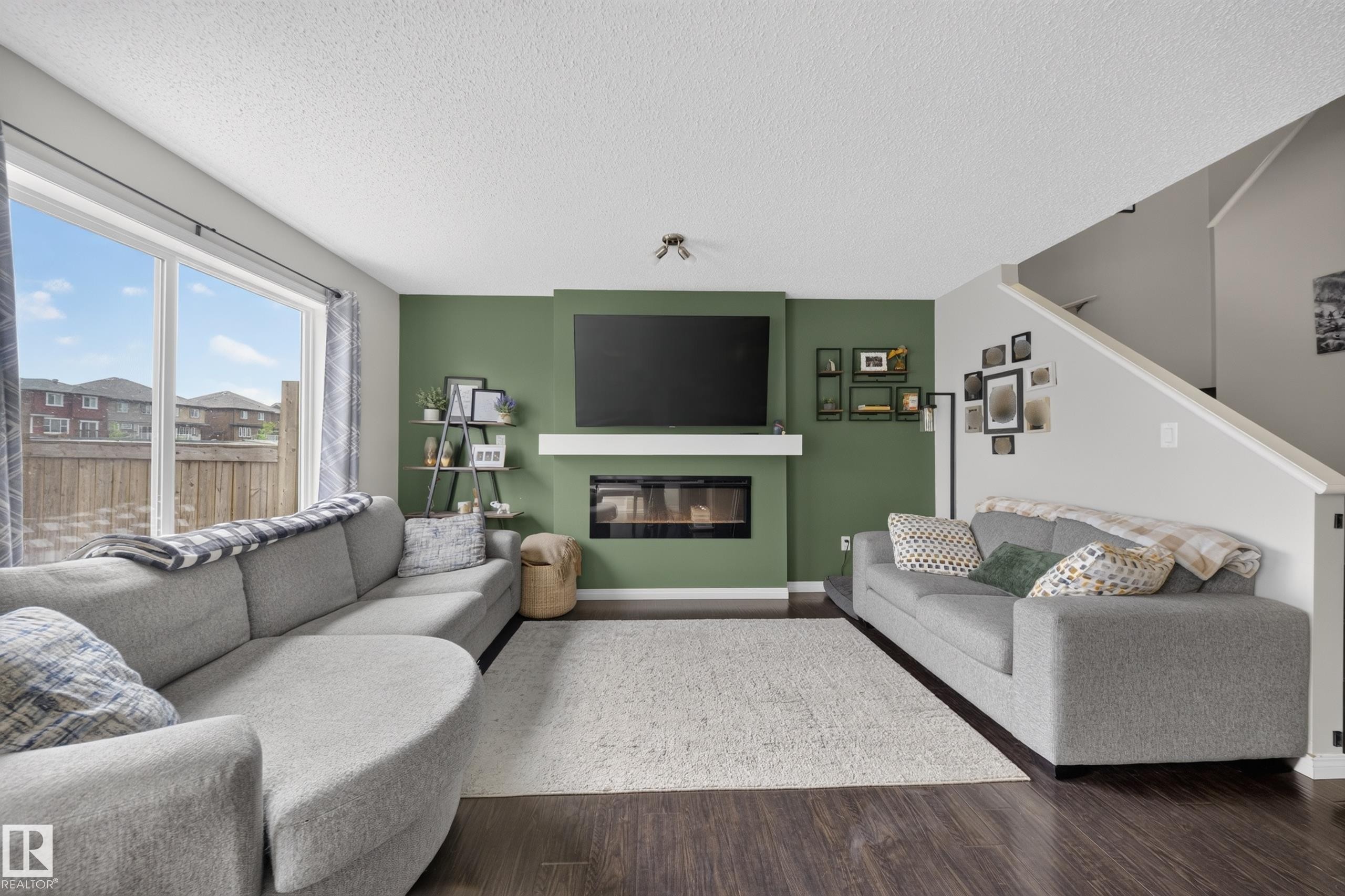 2155 67 Street Sw, Edmonton, AB - Indoor Photo Showing Living Room With Fireplace