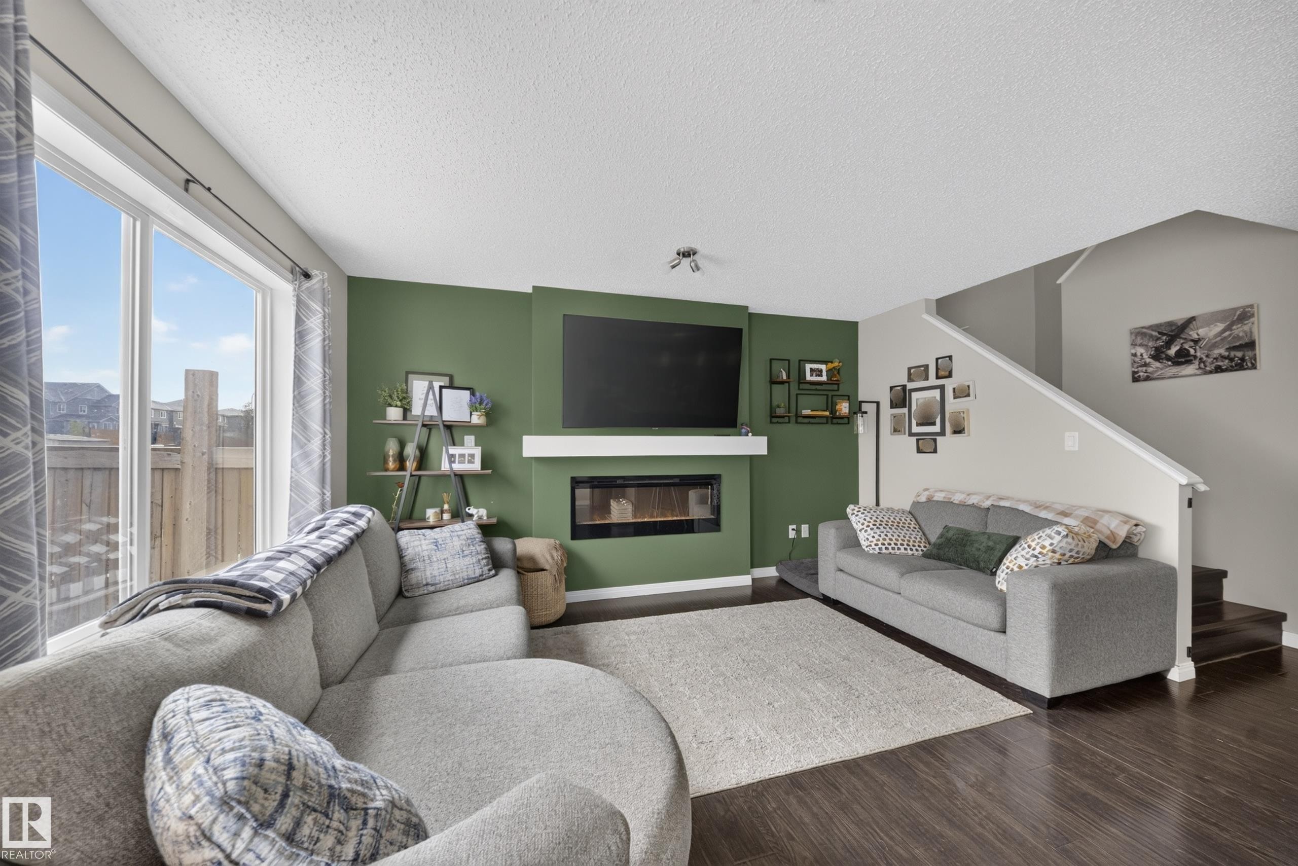 2155 67 Street Sw, Edmonton, AB - Indoor Photo Showing Living Room With Fireplace