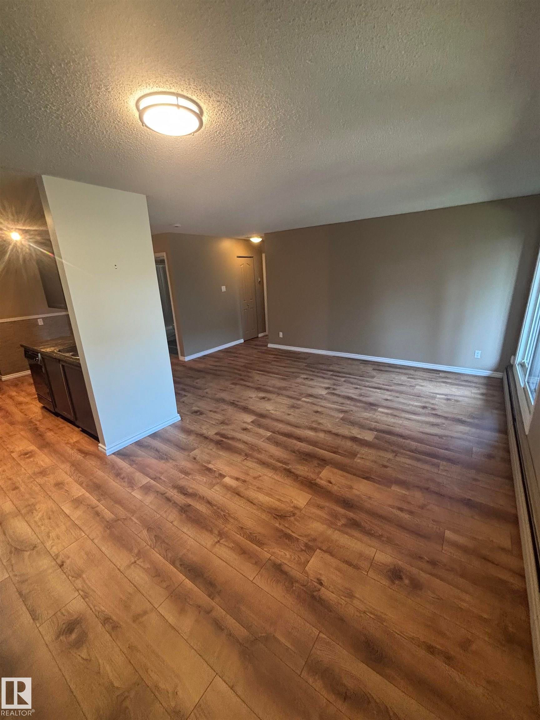 Empty room - #206 2311 119 St Nw, Edmonton, AB - Indoor Photo Showing Other Room