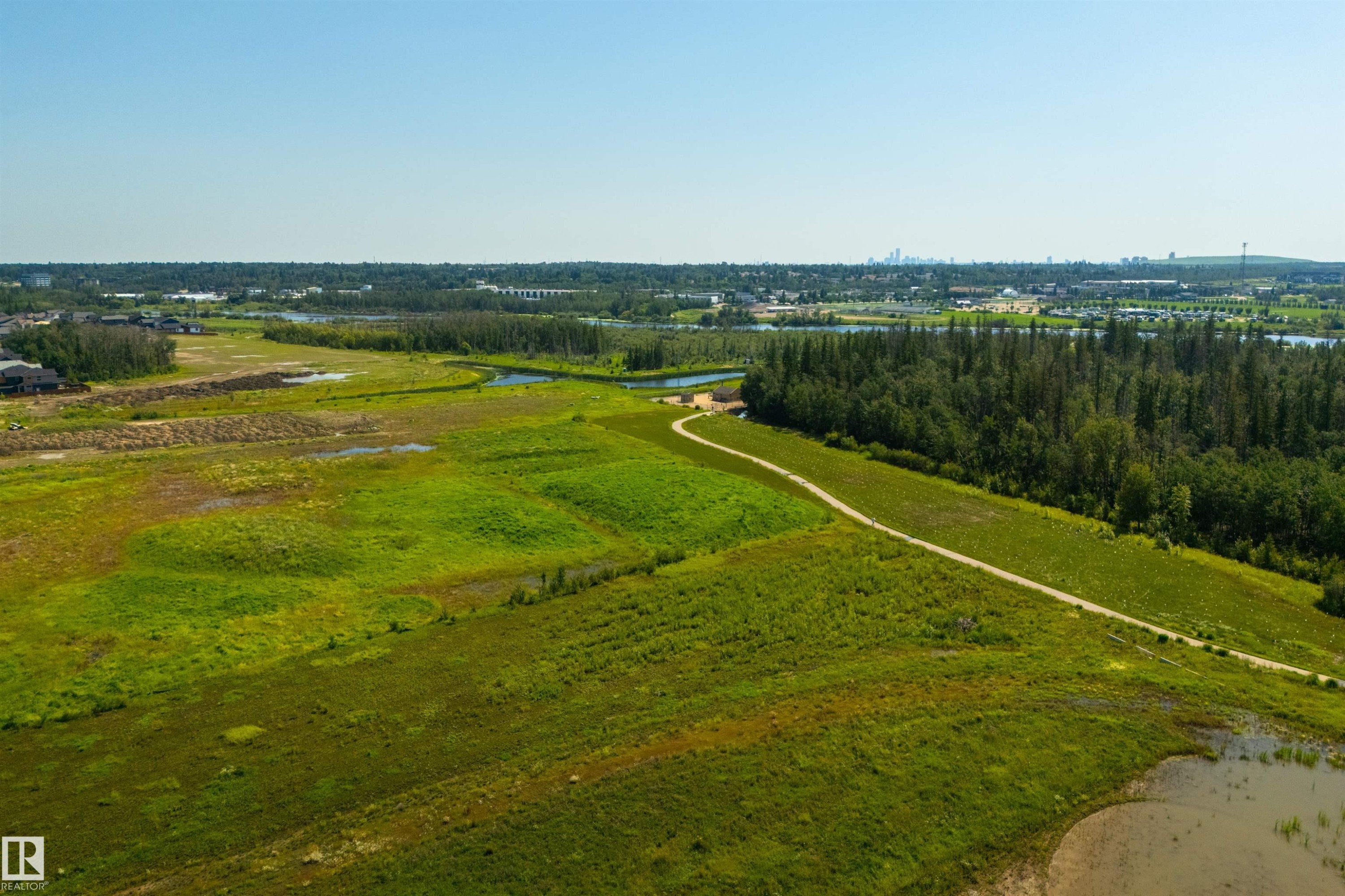 Expansive undeveloped land featuring natural terrain with varied vegetation - 323 Rankin Drive, St. Albert, AB - Outdoor With View