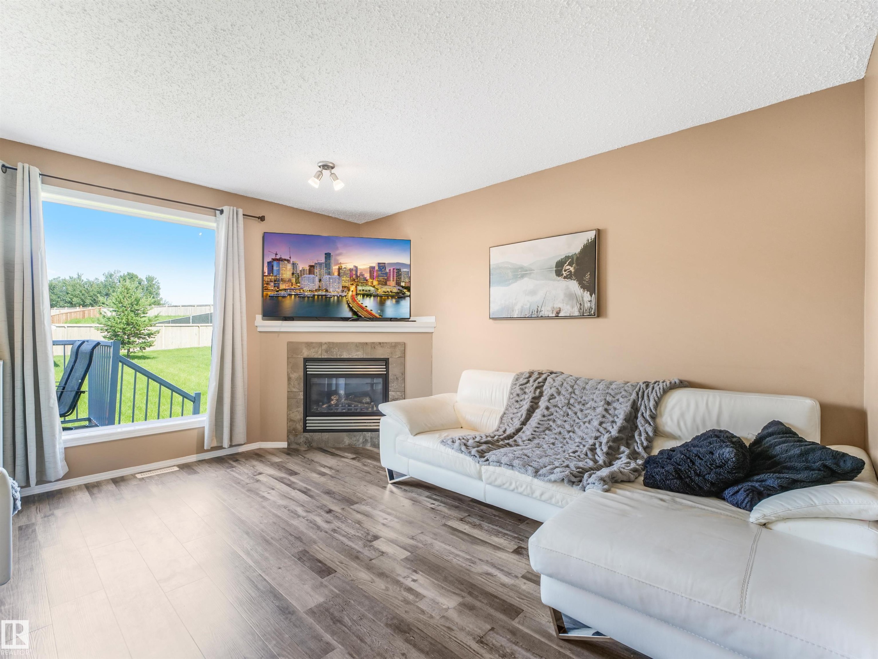 3635 11 Street Nw, Edmonton, AB - Indoor Photo Showing Living Room With Fireplace