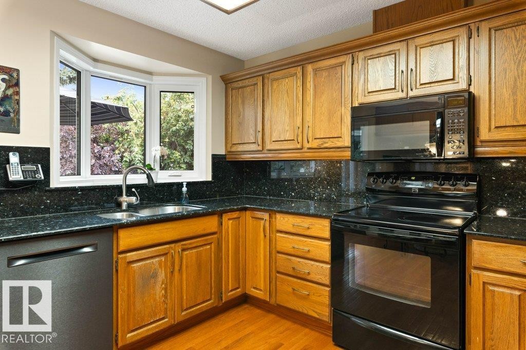 15 Lucien Drive, St. Albert, AB - Indoor Photo Showing Kitchen With Double Sink