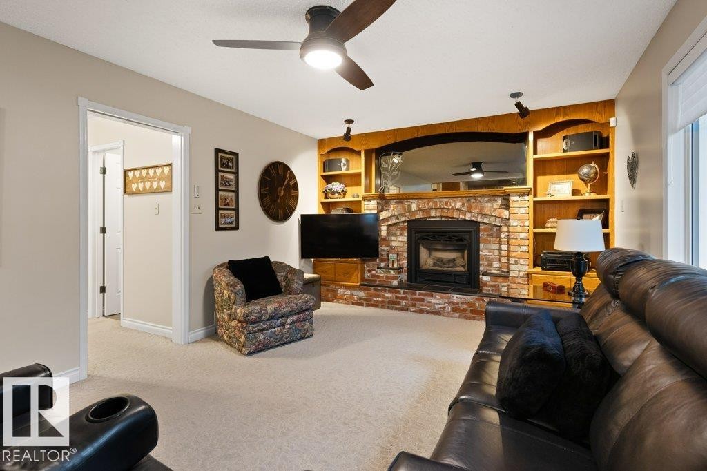 15 Lucien Drive, St. Albert, AB - Indoor Photo Showing Living Room With Fireplace