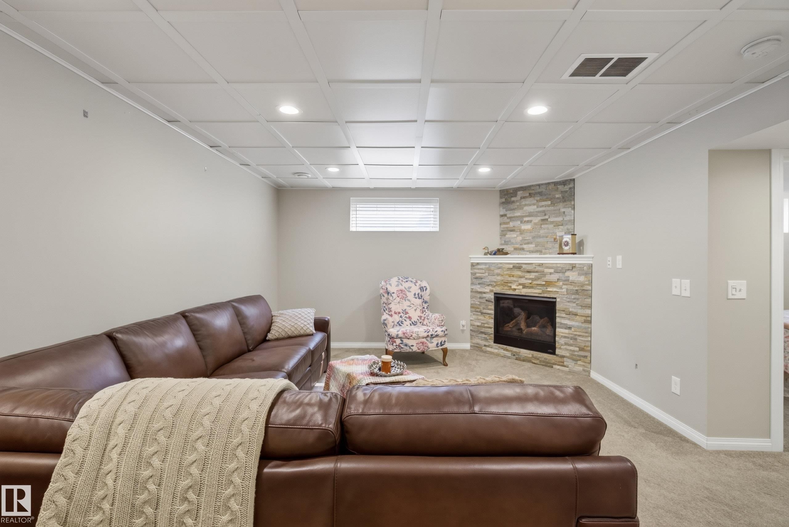 76 Leyland Way, Spruce Grove, AB - Indoor Photo Showing Other Room With Fireplace