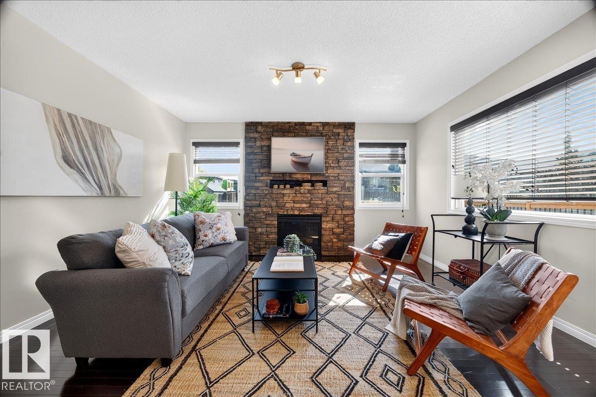18069 89 Street Nw, Edmonton, AB - Indoor Photo Showing Living Room With Fireplace