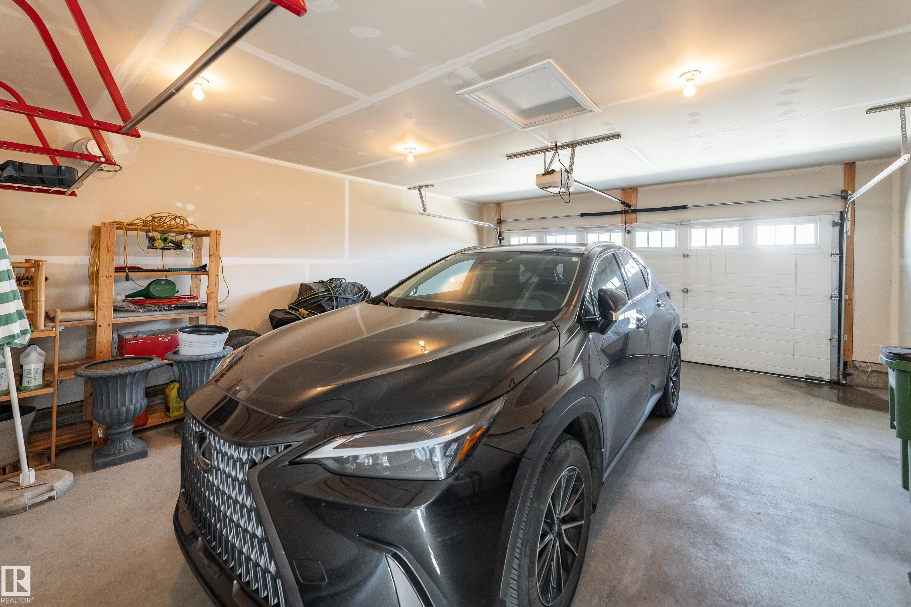 2338 Glenridding Boulevard Sw, Edmonton, AB - Indoor Photo Showing Garage