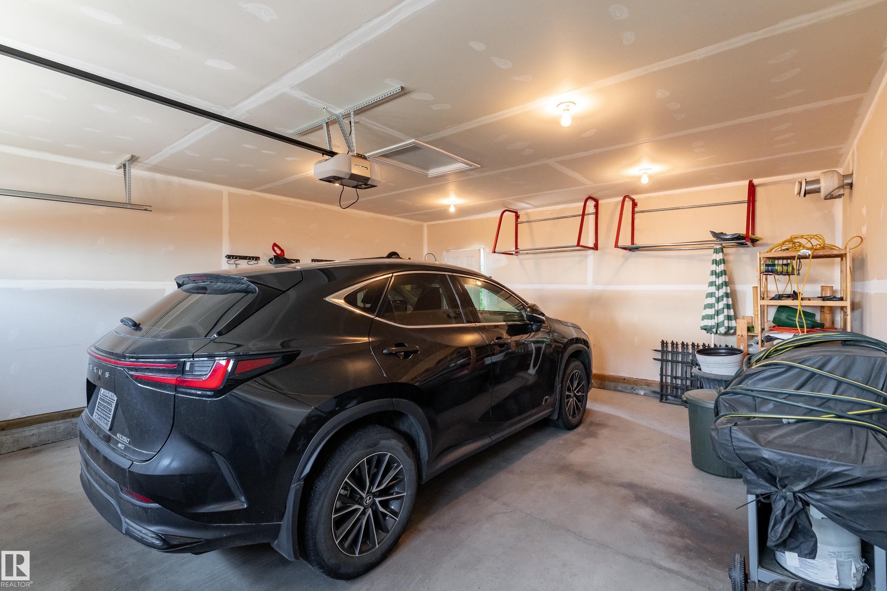 2338 Glenridding Boulevard Sw, Edmonton, AB - Indoor Photo Showing Garage