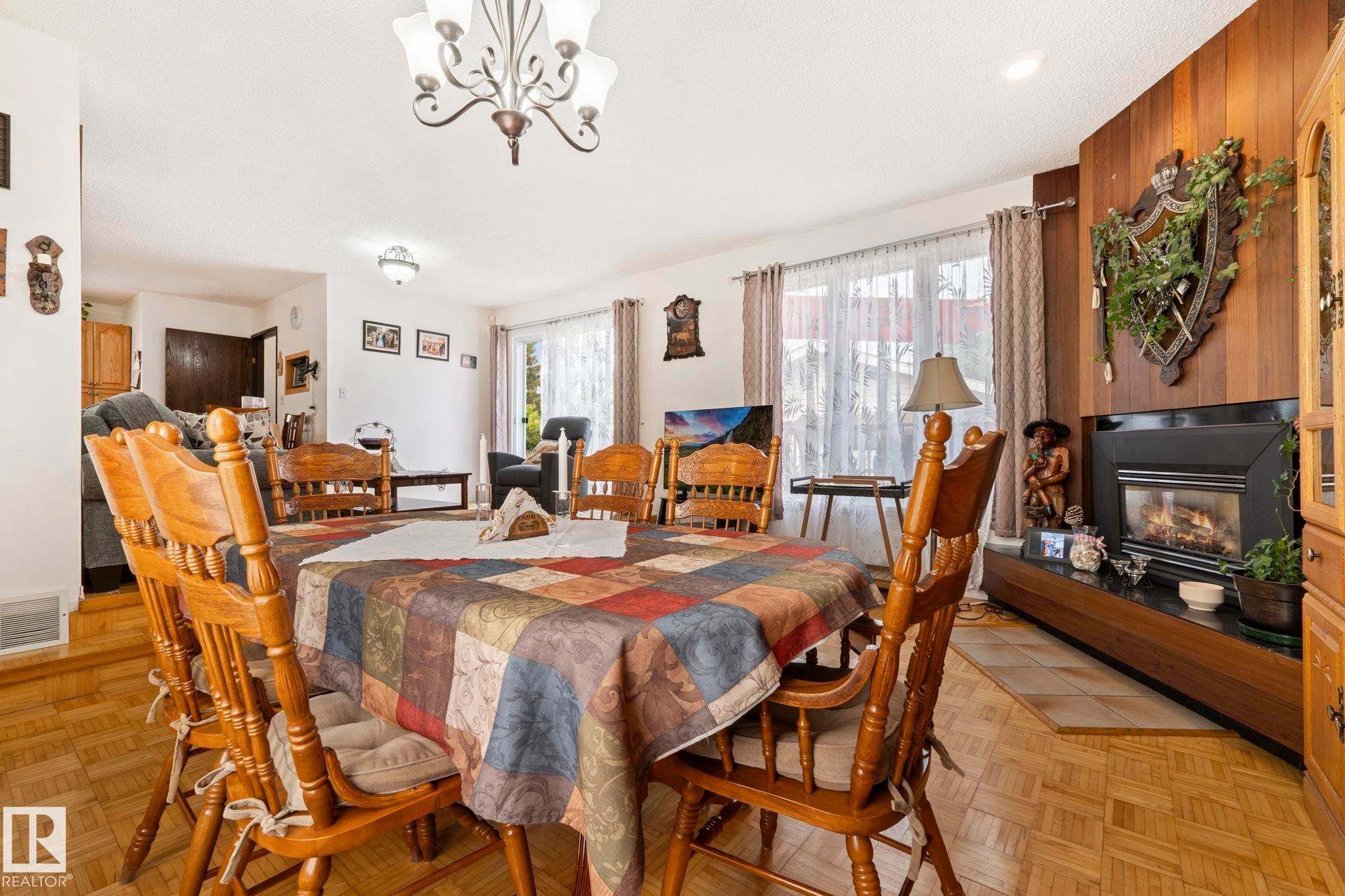 8704 43 Avenue Nw, Edmonton, AB - Indoor Photo Showing Dining Room With Fireplace