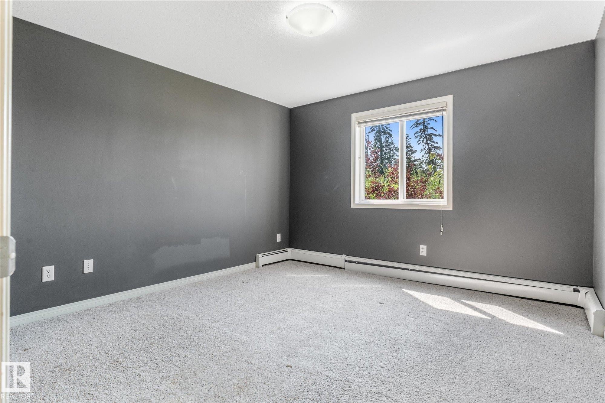 #208 4903 47 Av, Stony Plain, AB - Indoor Photo Showing Other Room