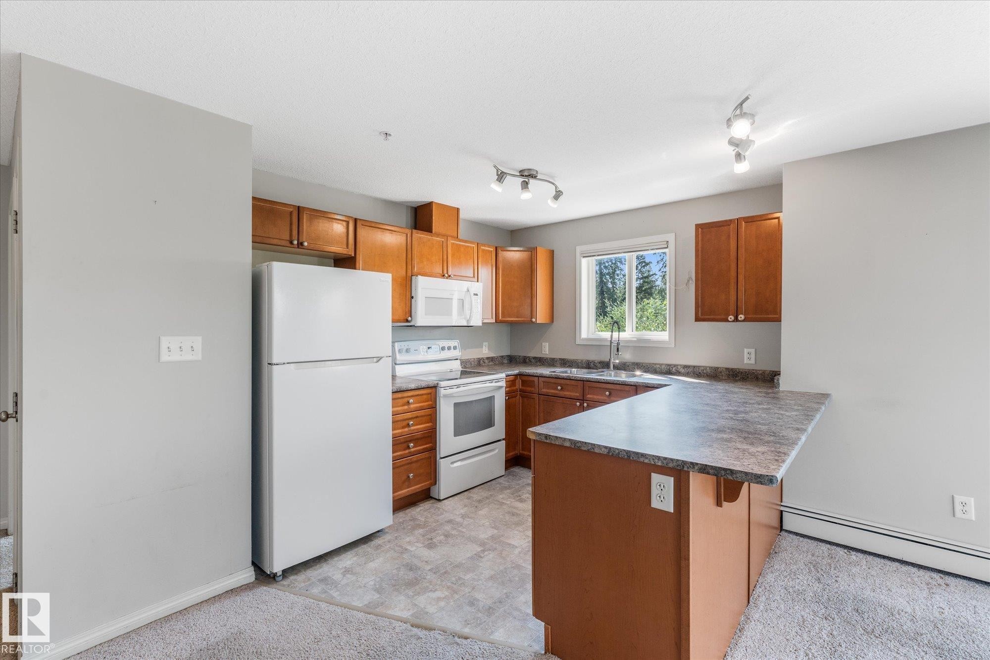 #208 4903 47 Av, Stony Plain, AB - Indoor Photo Showing Kitchen