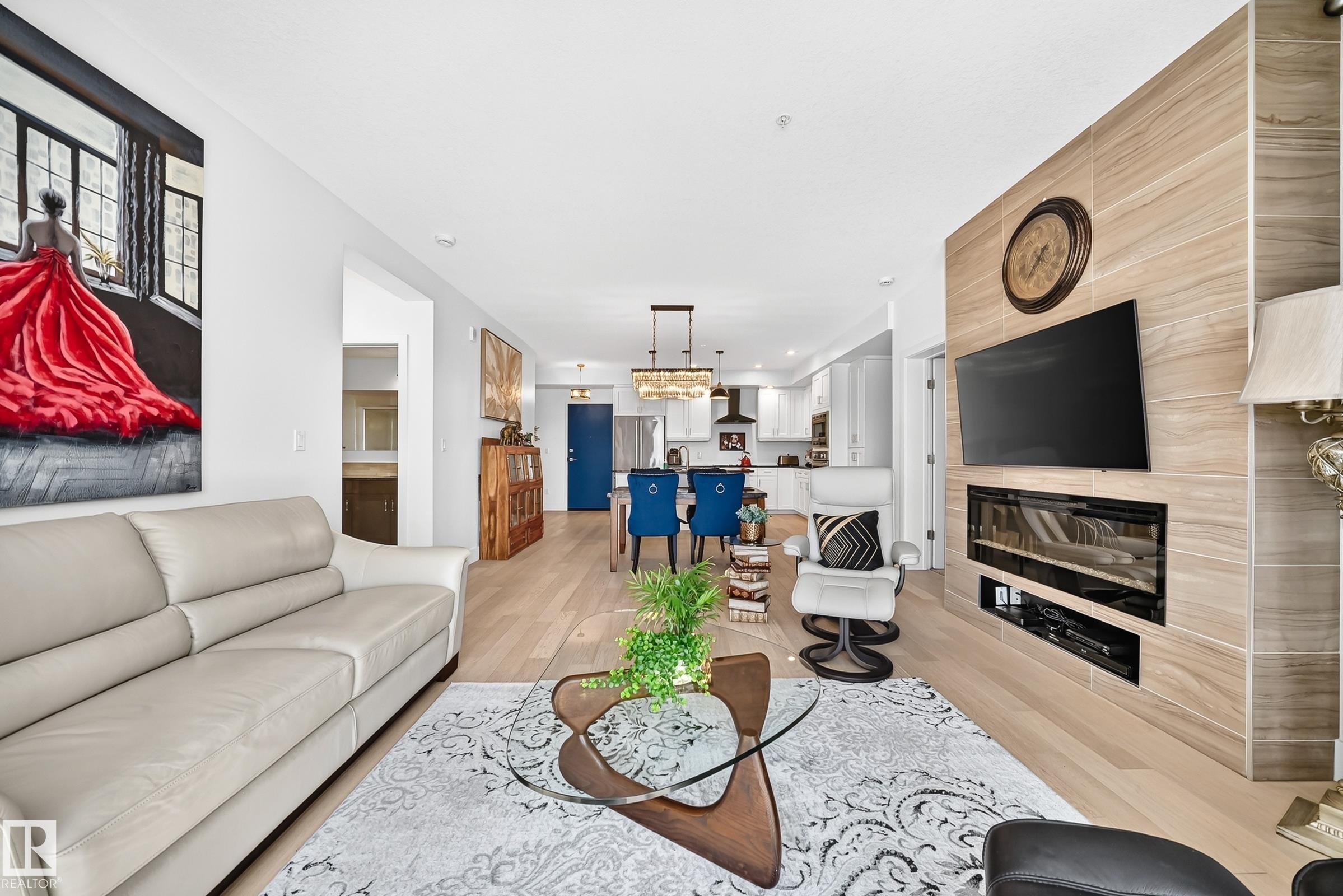#507 200 Bellerose Dr, St. Albert, AB - Indoor Photo Showing Living Room With Fireplace