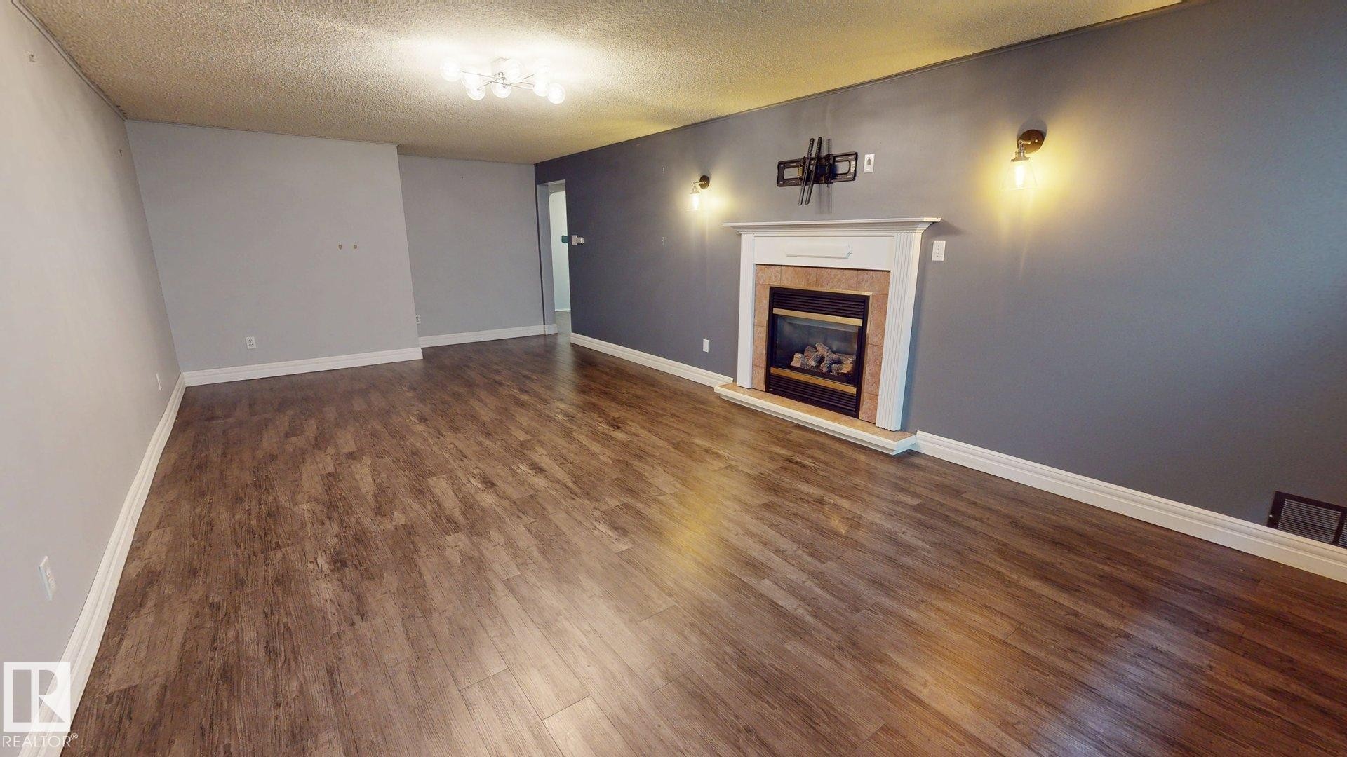 10661 152 Street Nw, Edmonton, AB - Indoor With Fireplace