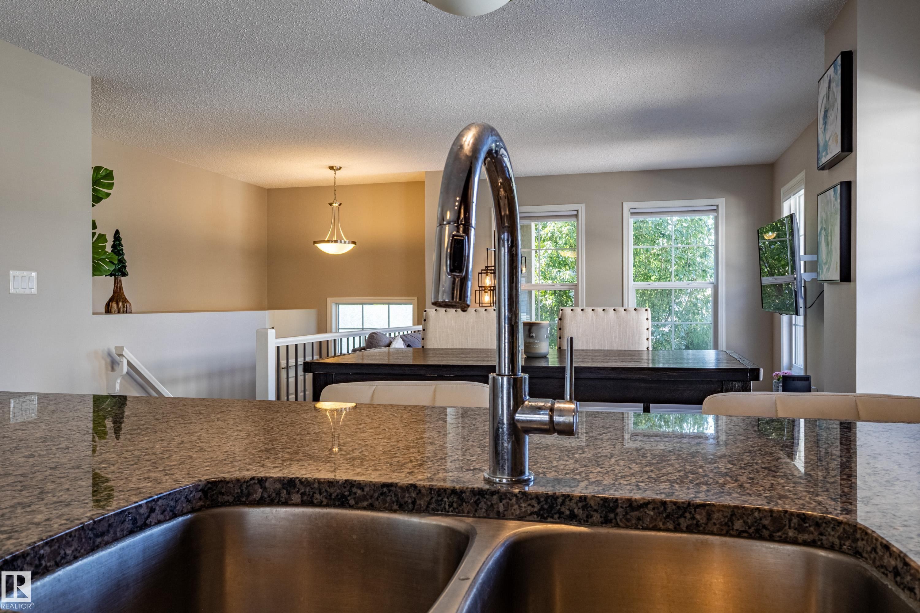 #54 4029 Orchards Dr Sw, Edmonton, AB - Indoor Photo Showing Kitchen With Double Sink