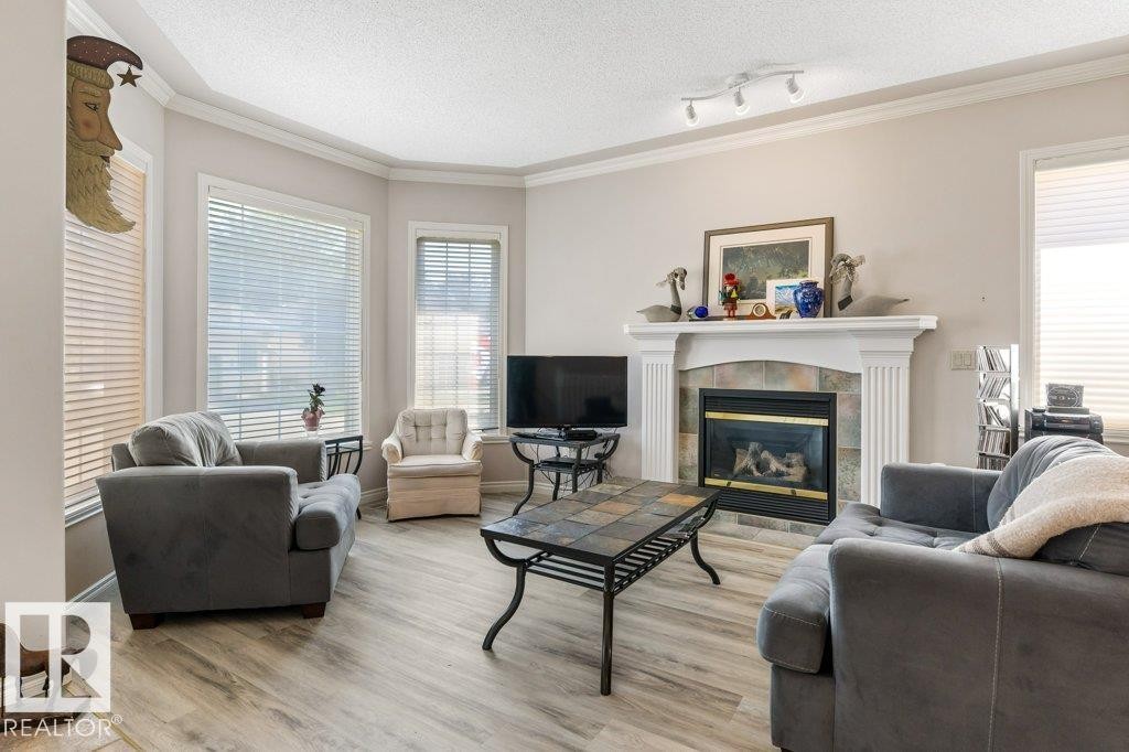 #27 170 Kingswood Bv, St. Albert, AB - Indoor Photo Showing Living Room With Fireplace