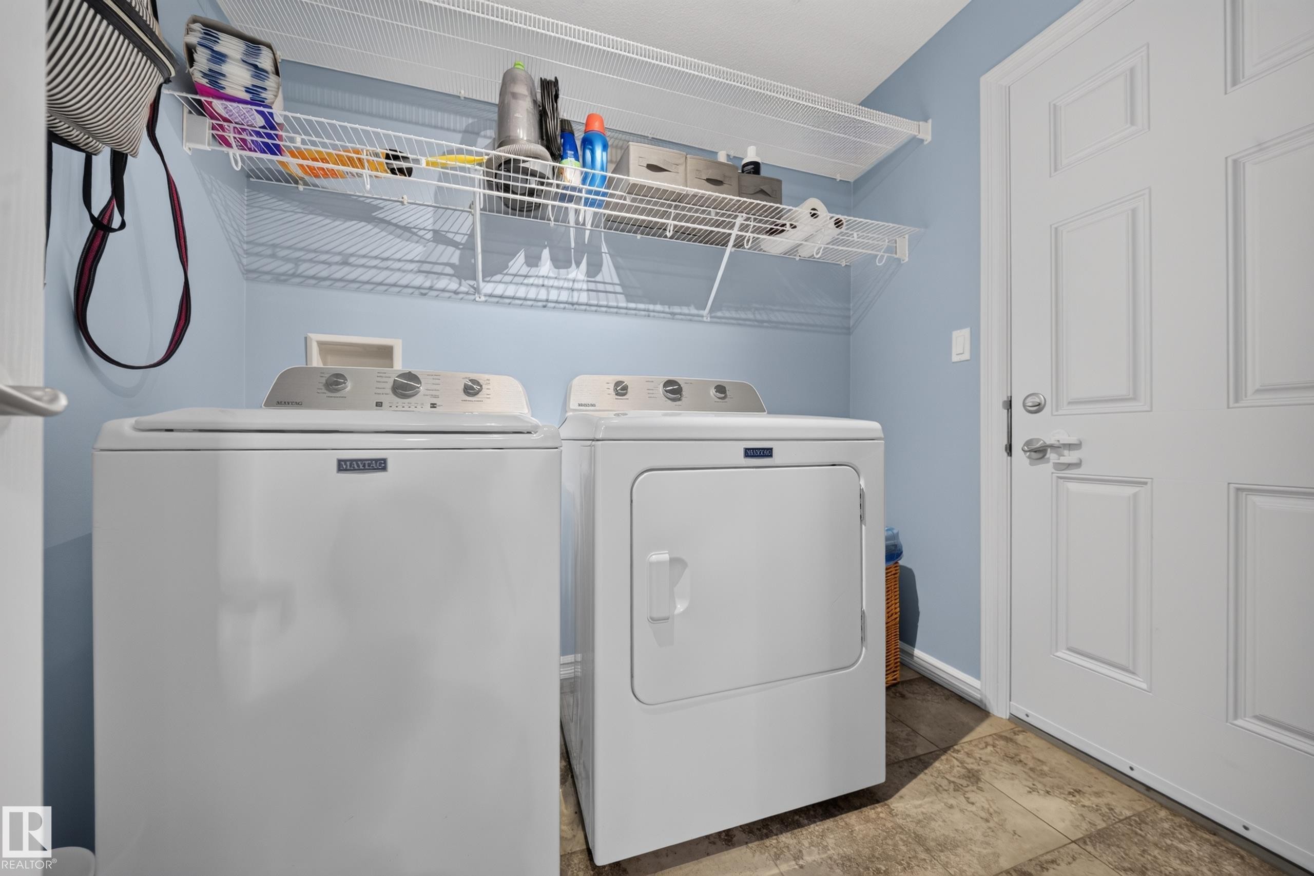 90 Rue Montalet, Beaumont, AB - Indoor Photo Showing Laundry Room