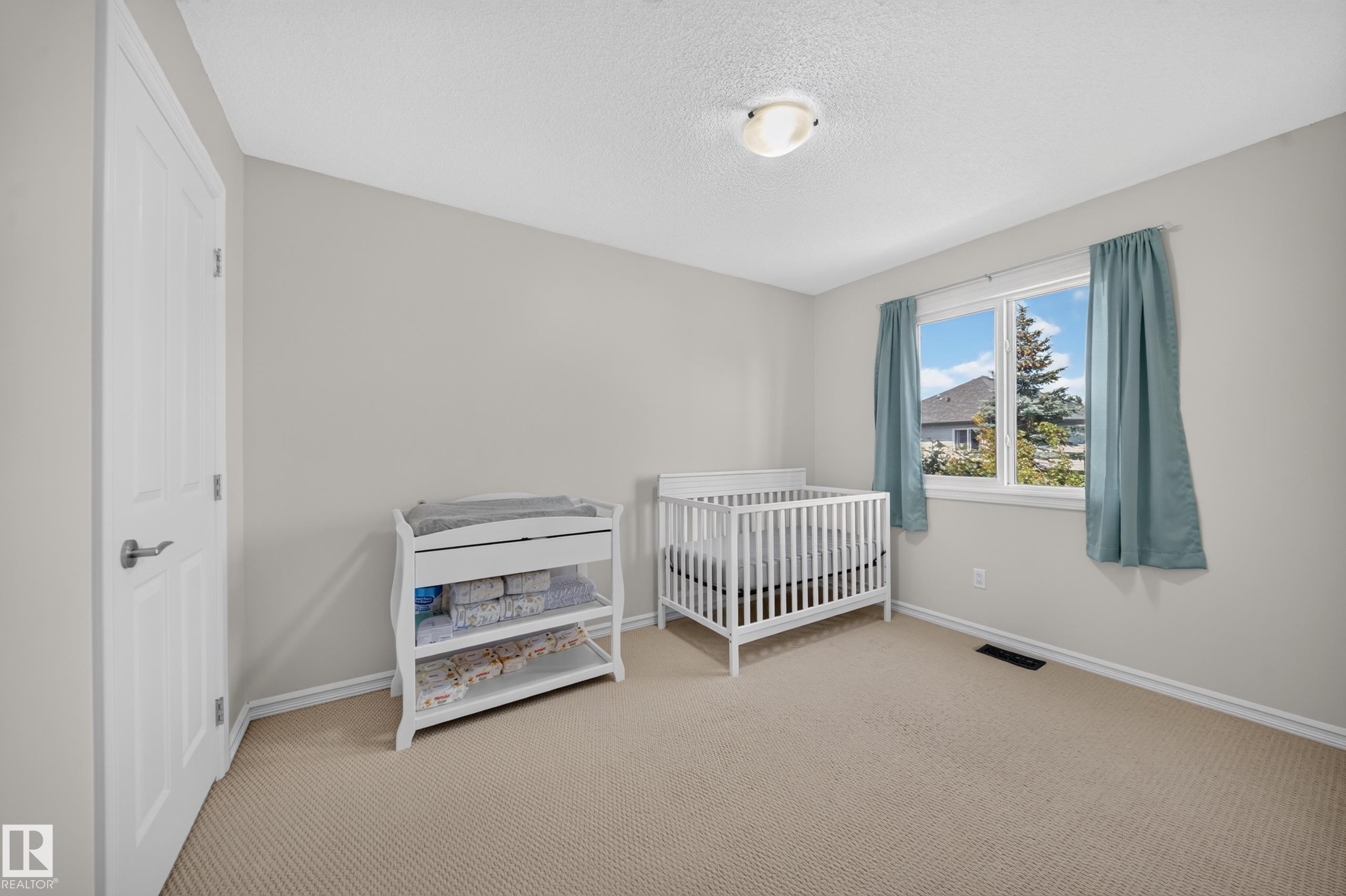 90 Rue Montalet, Beaumont, AB - Indoor Photo Showing Bedroom