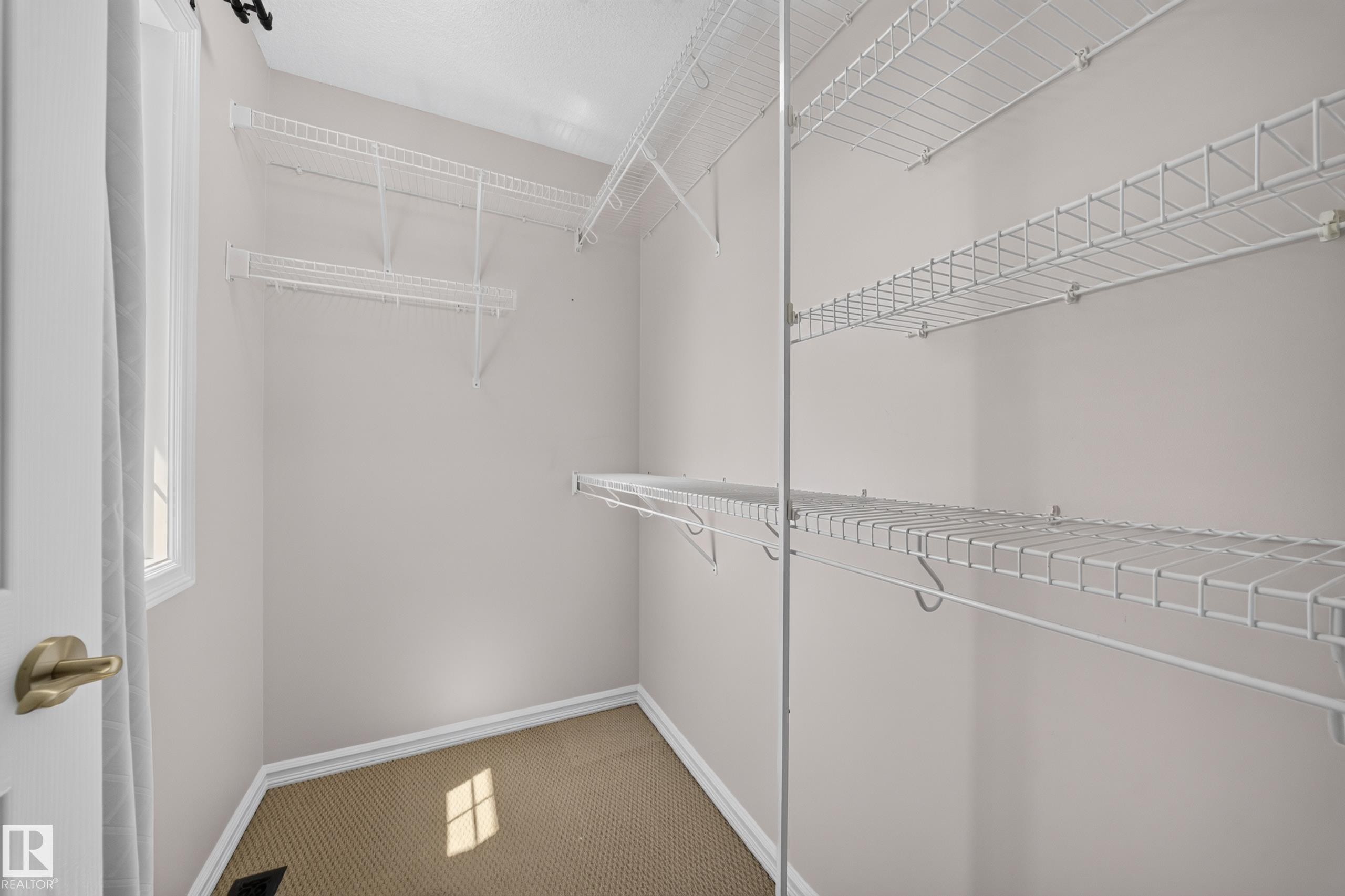 90 Rue Montalet, Beaumont, AB - Indoor With Storage