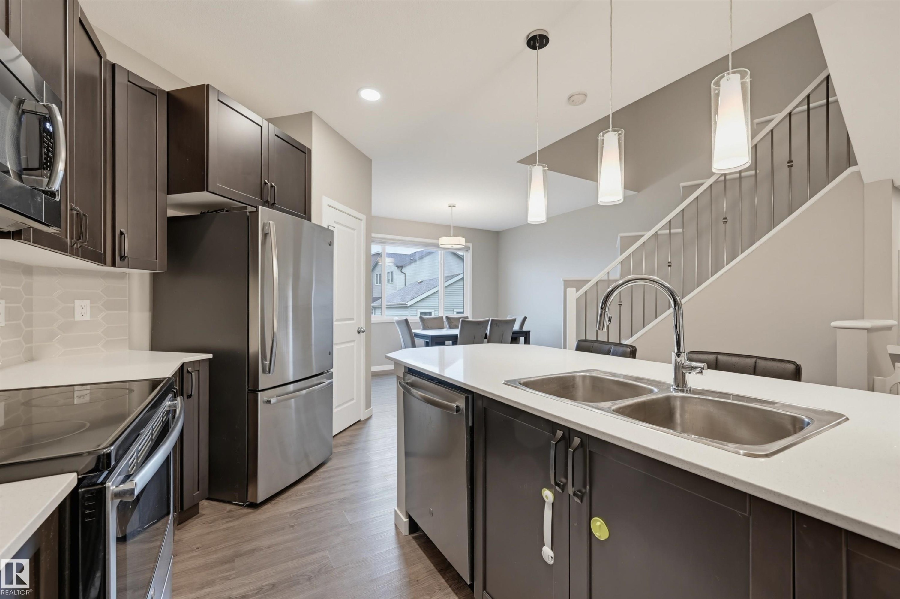 5175 Edgemont Boulevard Nw, Edmonton, AB - Indoor Photo Showing Kitchen With Stainless Steel Kitchen With Double Sink With Upgraded Kitchen