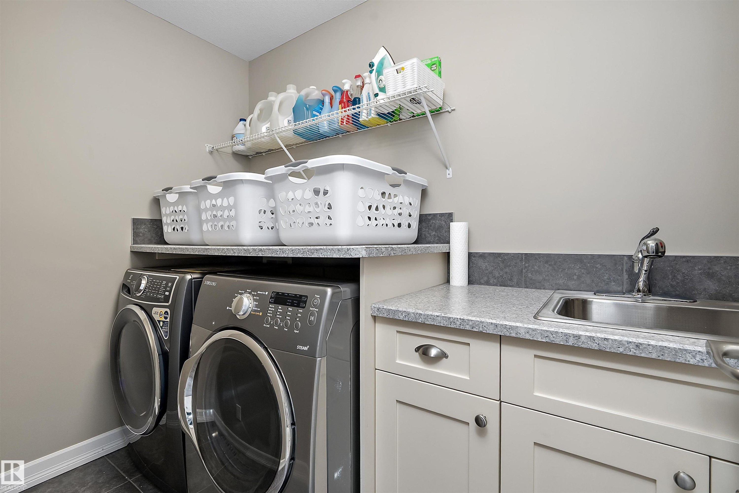 180 Sheppard Circle, Leduc, AB - Indoor Photo Showing Laundry Room
