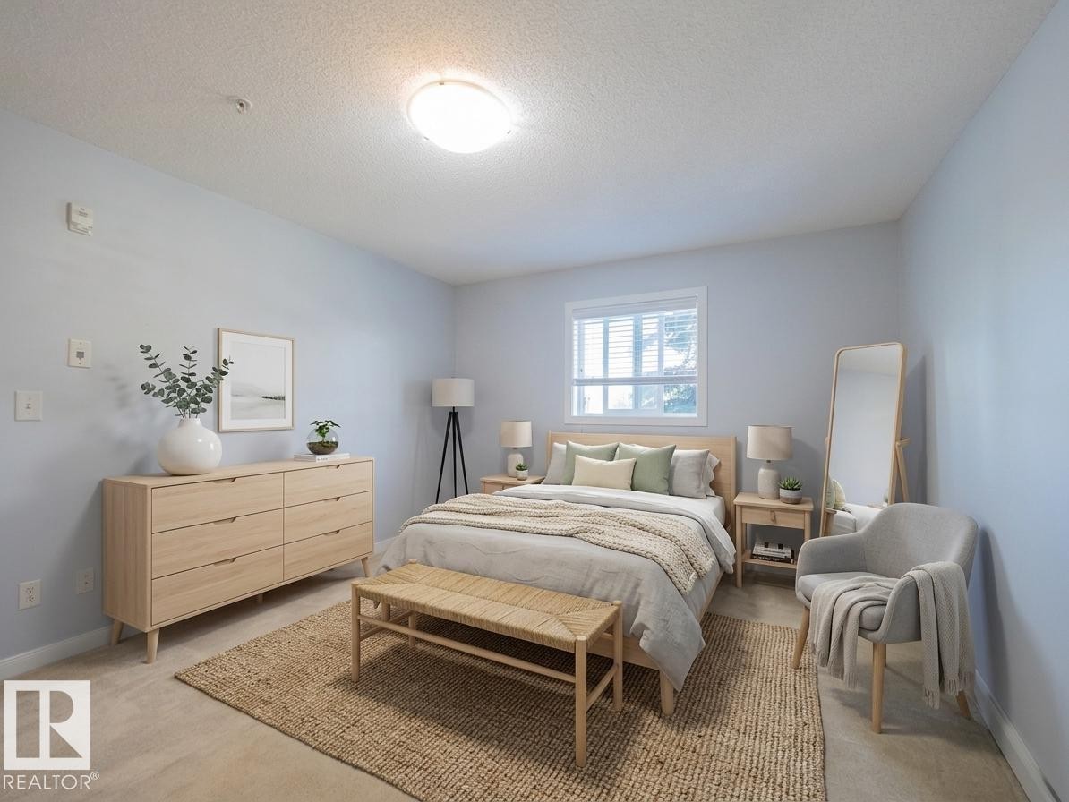 #216 392 Silverberry Road Nw, Edmonton, AB - Indoor Photo Showing Bedroom