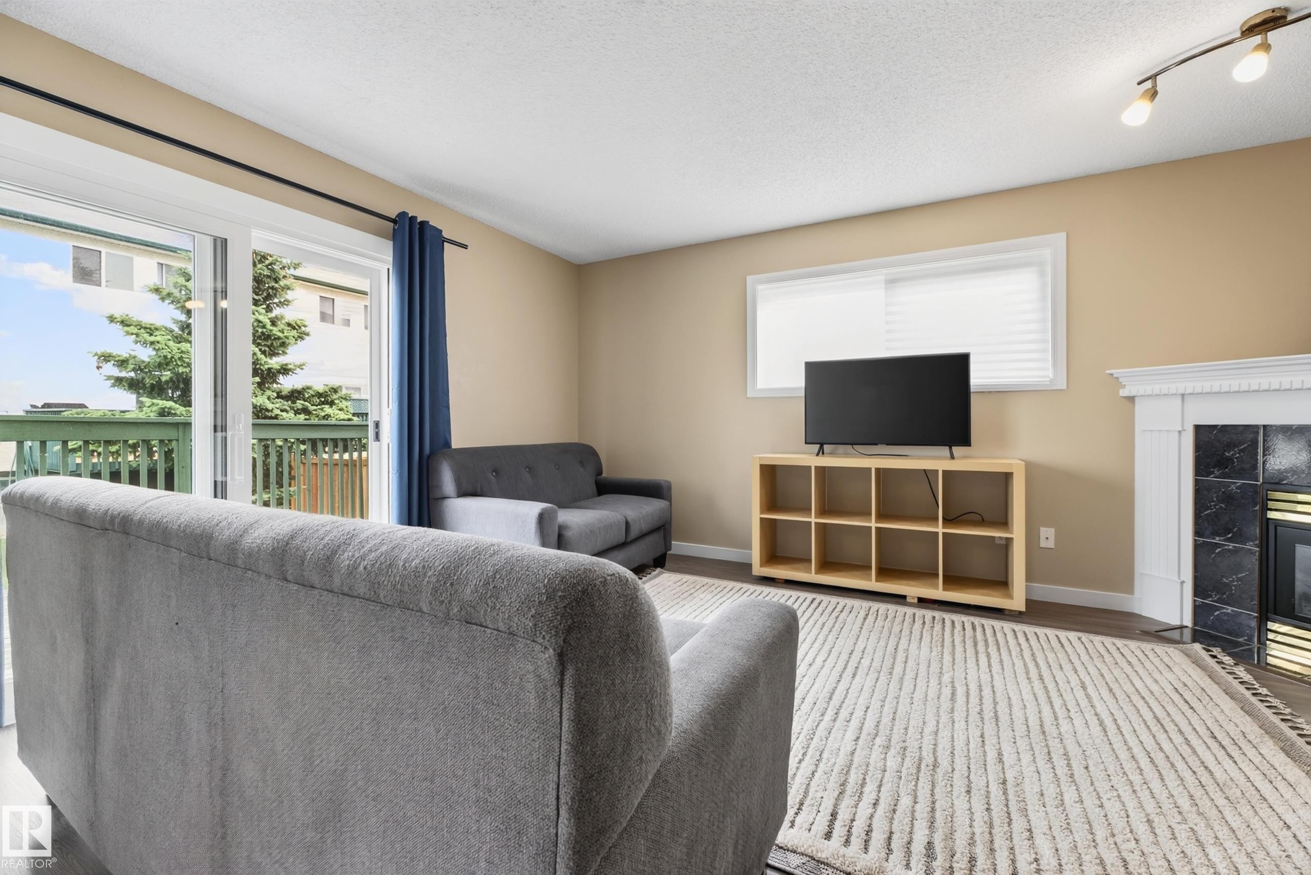 1906 65 Street Nw, Edmonton, AB - Indoor Photo Showing Other Room With Fireplace
