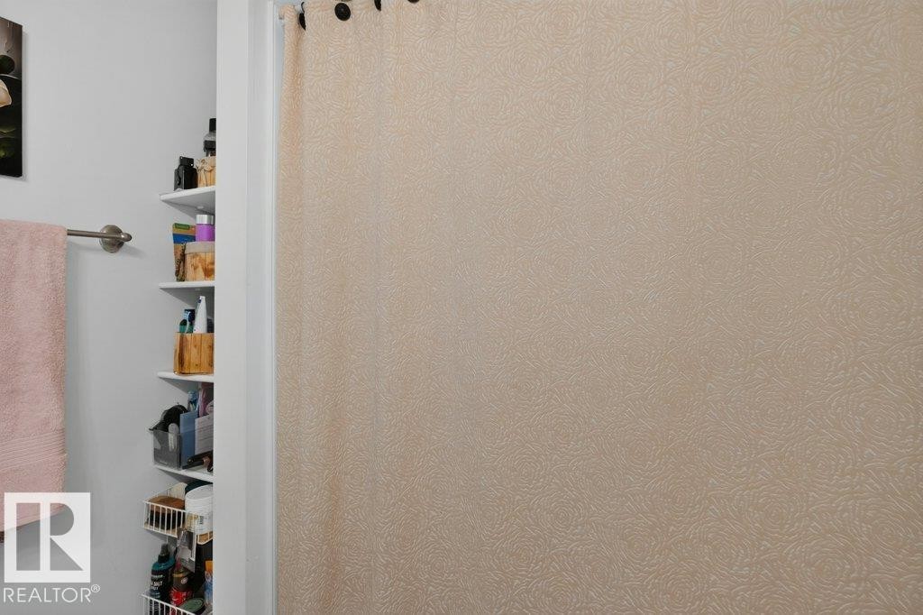 Built-in shelving for organized storage - 12219 89 Street Nw, Edmonton, AB -