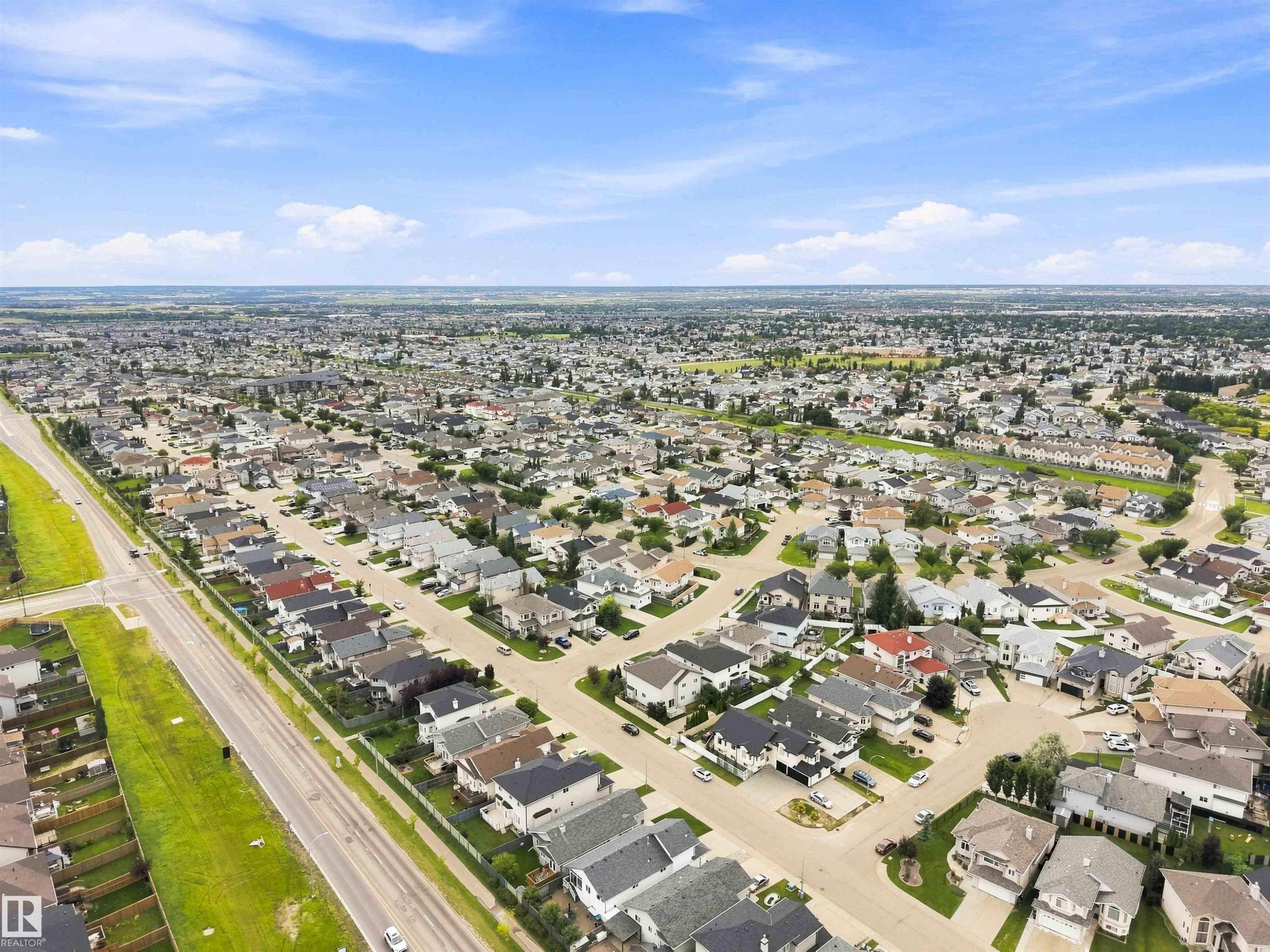 Expansive residential area featuring numerous single-family homes, established streets, and mature landscaping - 6320 166 Avenue Nw, Edmonton, AB - Outdoor With View
