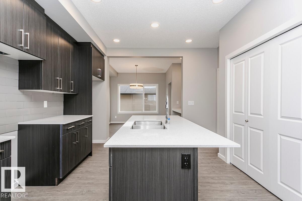 306 Hawthorn Way, Leduc, AB - Indoor Photo Showing Kitchen