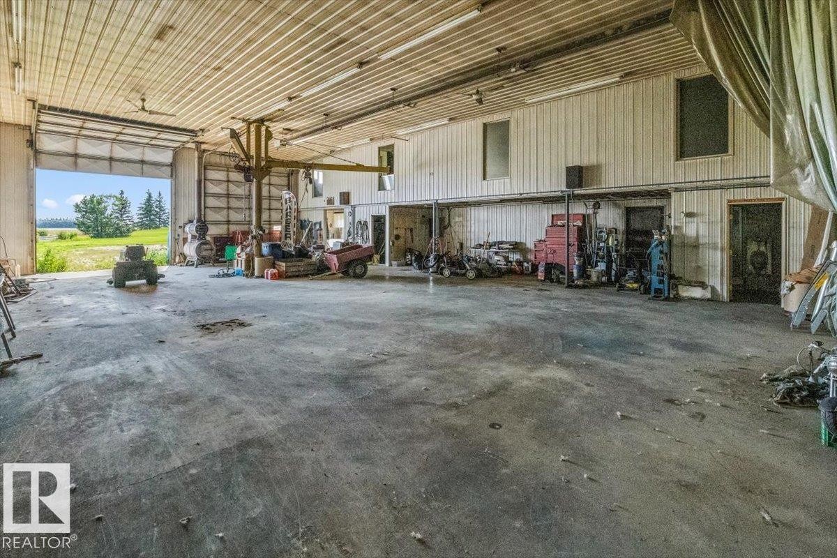 54115 Range Road 270, Rural Sturgeon County, AB - Indoor Photo Showing Garage