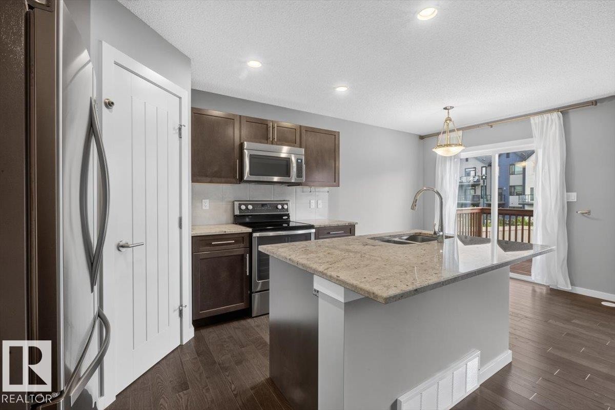 632 42 Avenue Nw, Edmonton, AB - Indoor Photo Showing Kitchen With Stainless Steel Kitchen With Double Sink With Upgraded Kitchen