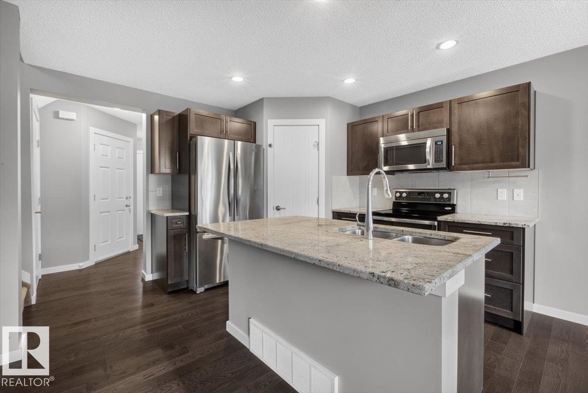 632 42 Avenue Nw, Edmonton, AB - Indoor Photo Showing Kitchen With Stainless Steel Kitchen With Double Sink With Upgraded Kitchen