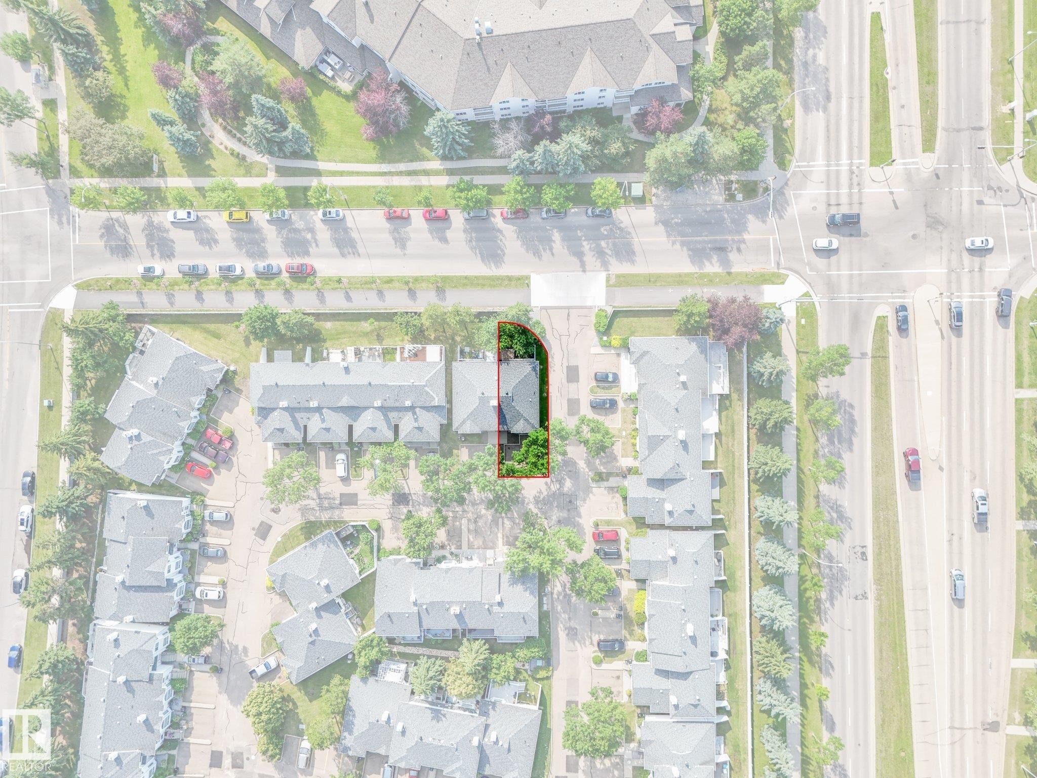Aerial perspective highlighting a property with mature tree cover and a private driveway - #2 3311 58 St Nw, Edmonton, AB - Other