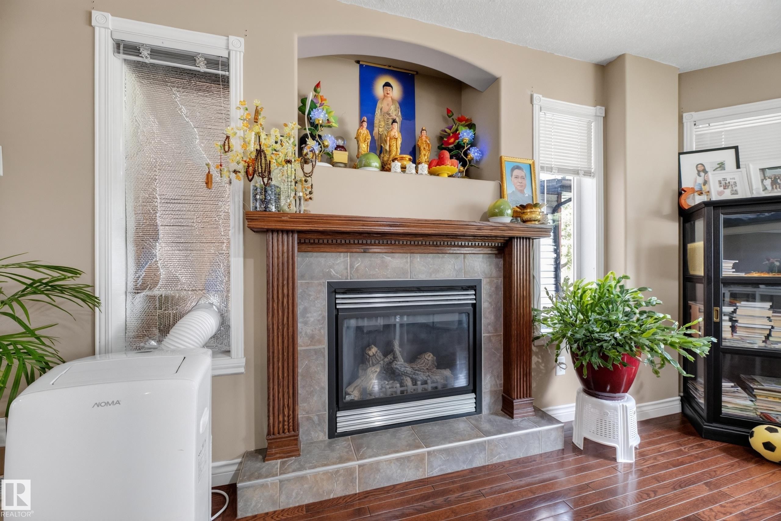 6514 106 Street Nw, Edmonton, AB - Indoor Photo Showing Living Room With Fireplace
