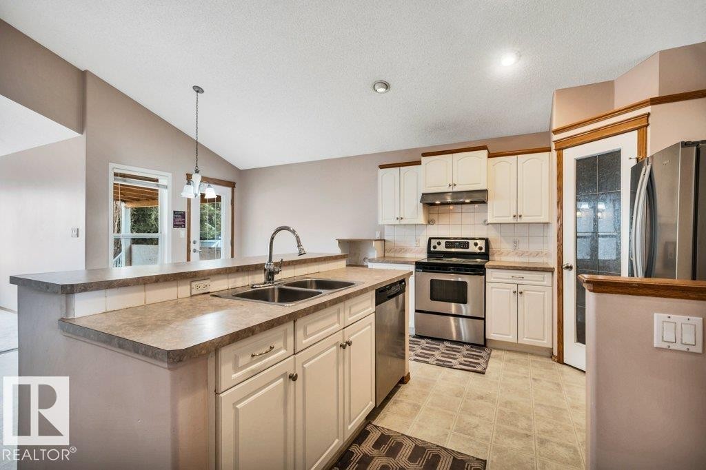 4051 33 Street Nw, Edmonton, AB - Indoor Photo Showing Kitchen With Stainless Steel Kitchen With Double Sink