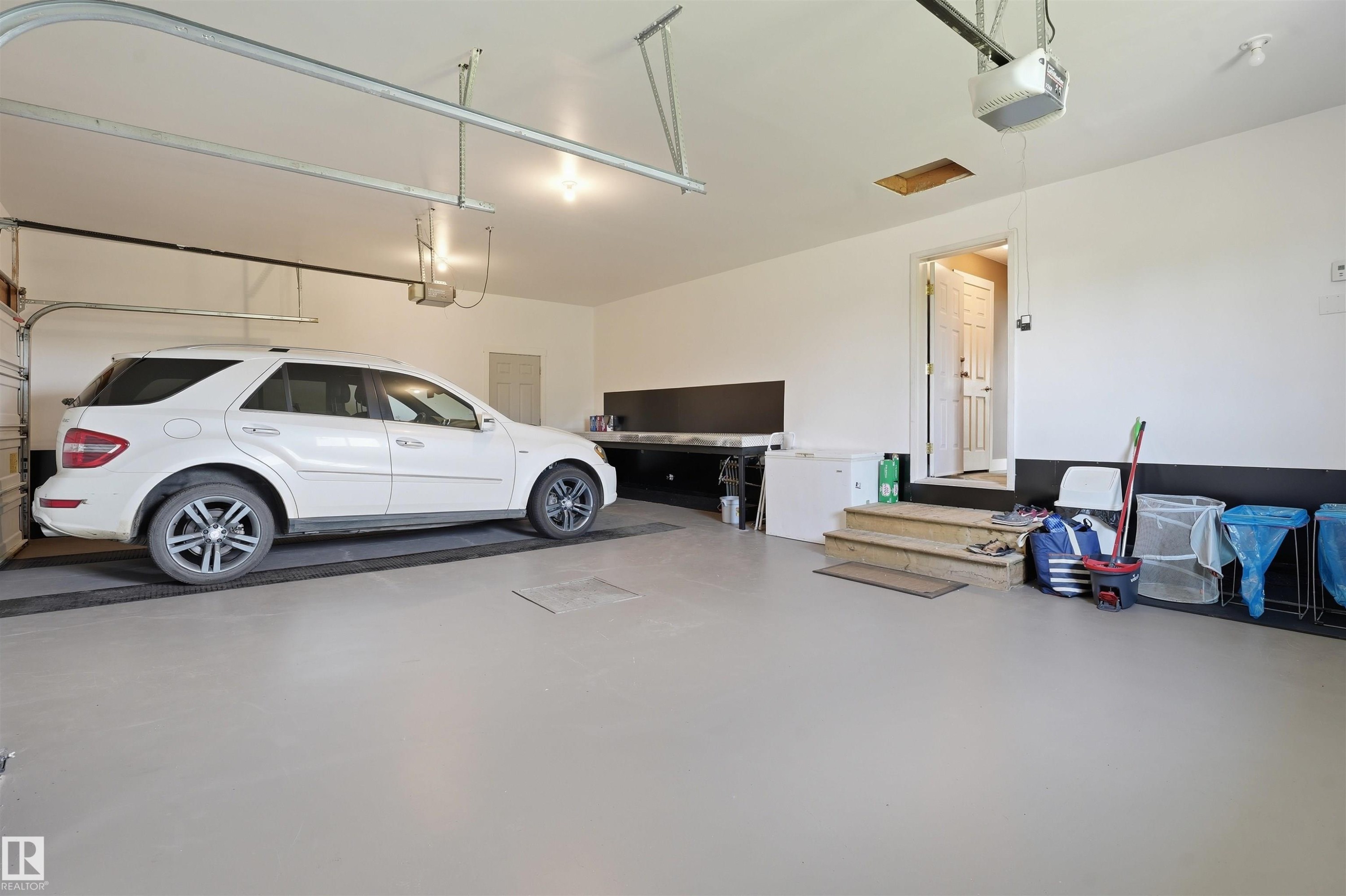 #43 27507 Twp Road 544, Rural Sturgeon County, AB - Indoor Photo Showing Garage