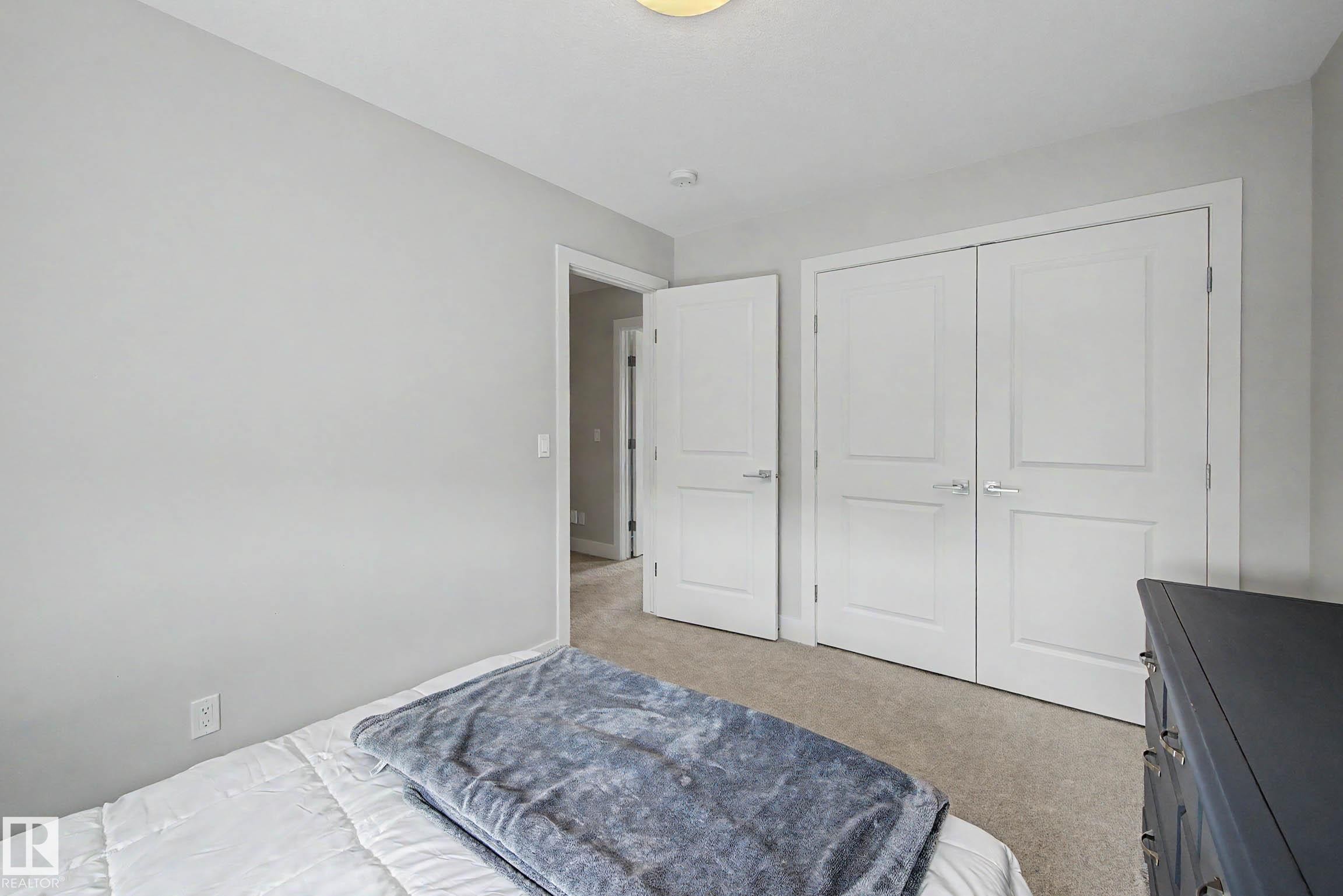 924 Morris Way, Leduc, AB - Indoor Photo Showing Bedroom