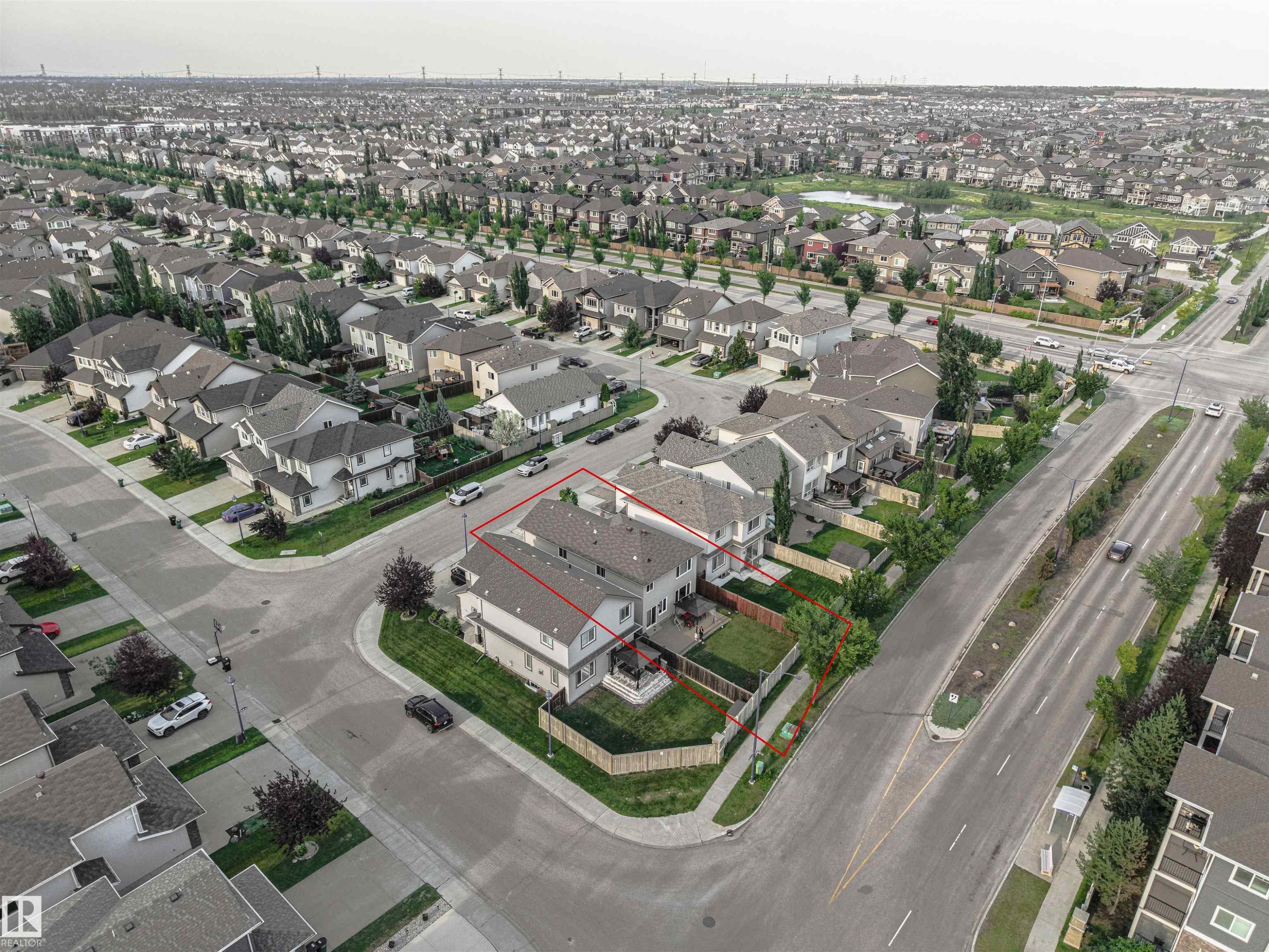 Corner lot property with a fenced backyard and a paved driveway - 6727 20 Ave Sw, Edmonton, AB - Other