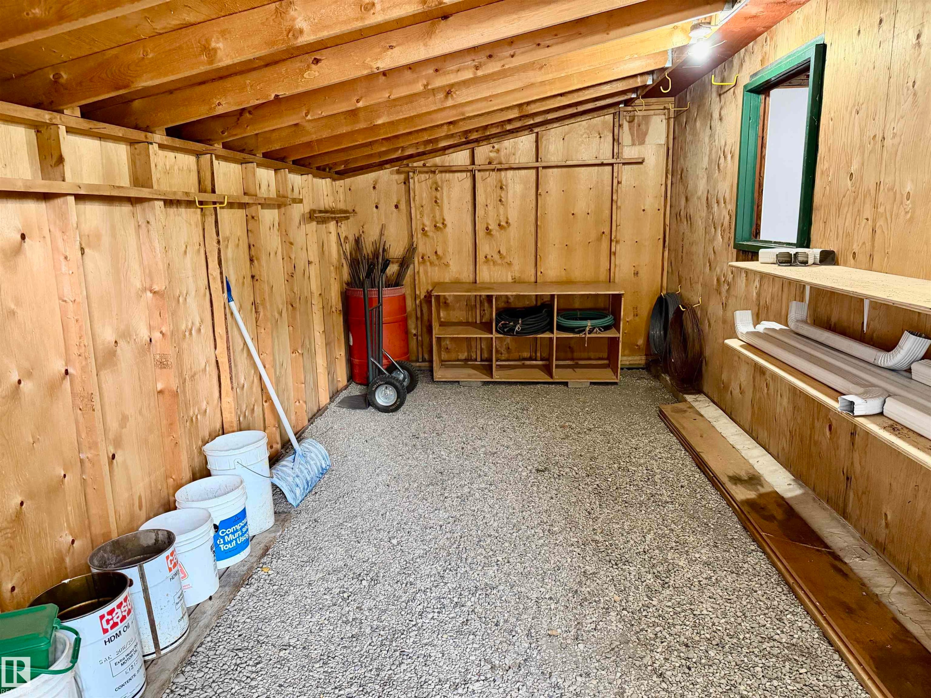 Interior Wood burning Stove - 54046 Rge Road 213, Rural Strathcona County, AB - Indoor Photo Showing Basement
