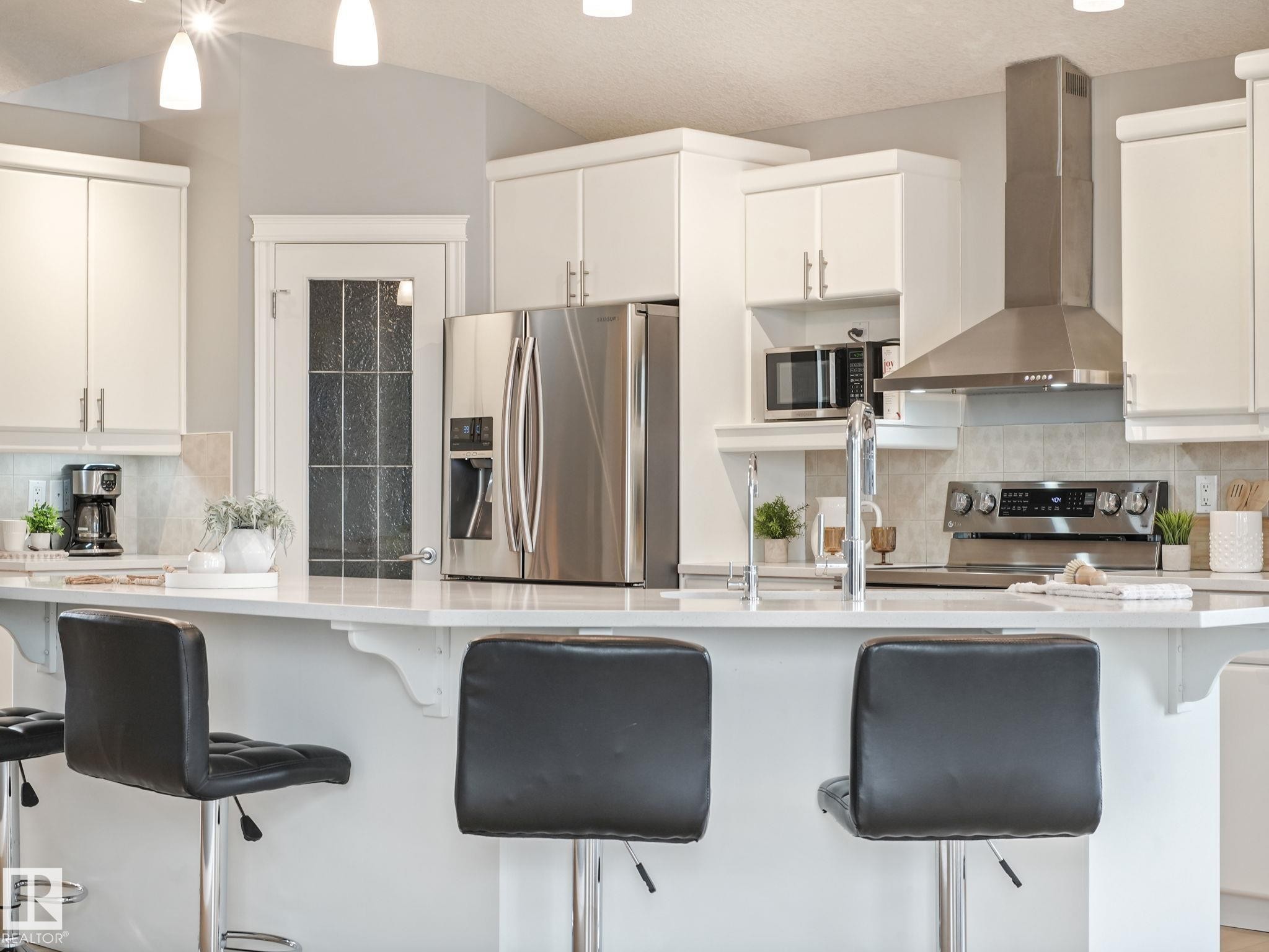 4115 58 Street, Beaumont, AB - Indoor Photo Showing Kitchen With Upgraded Kitchen
