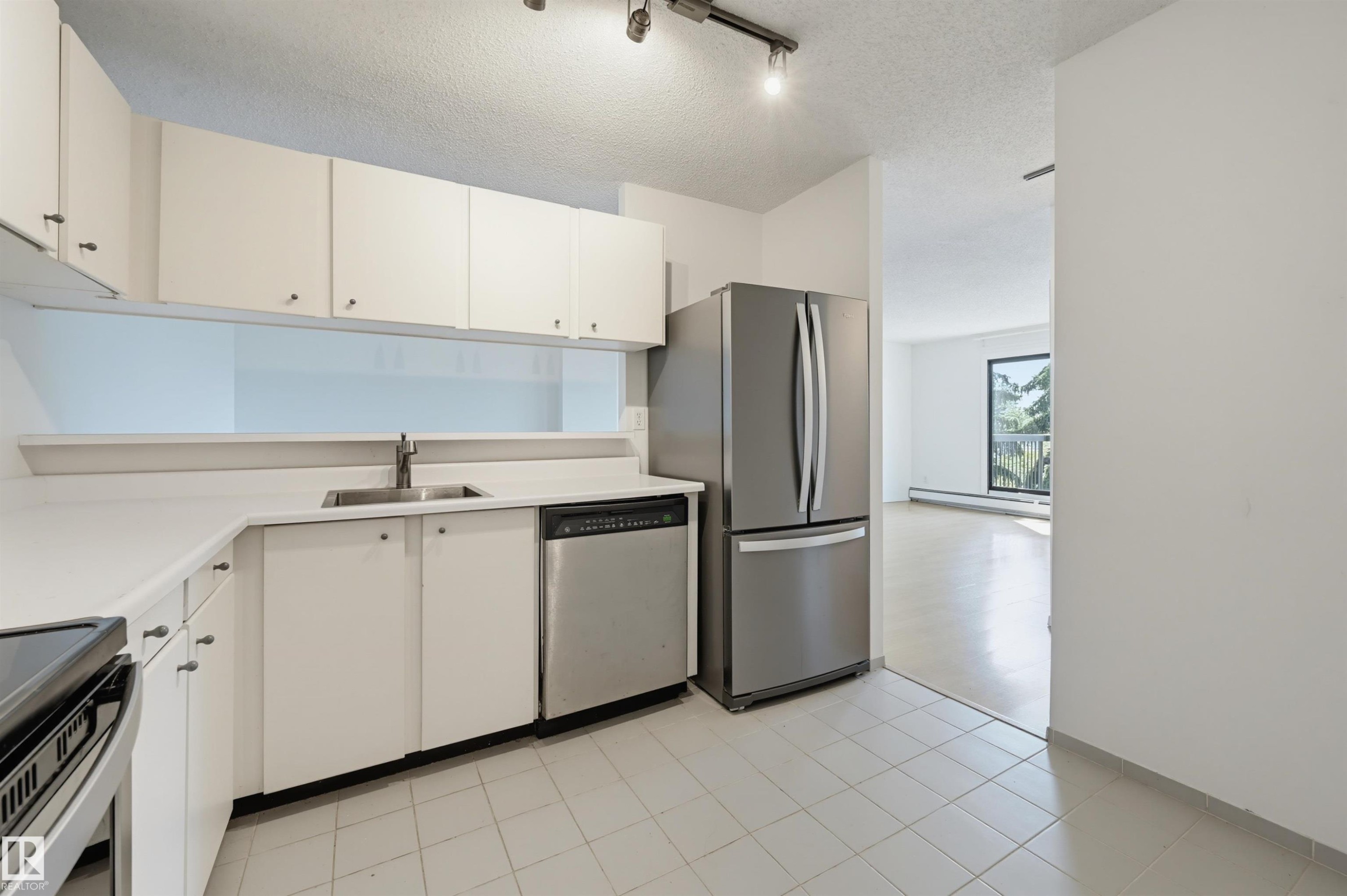 #502 10545 Saskatchewan Dr Nw, Edmonton, AB - Indoor Photo Showing Kitchen With Stainless Steel Kitchen