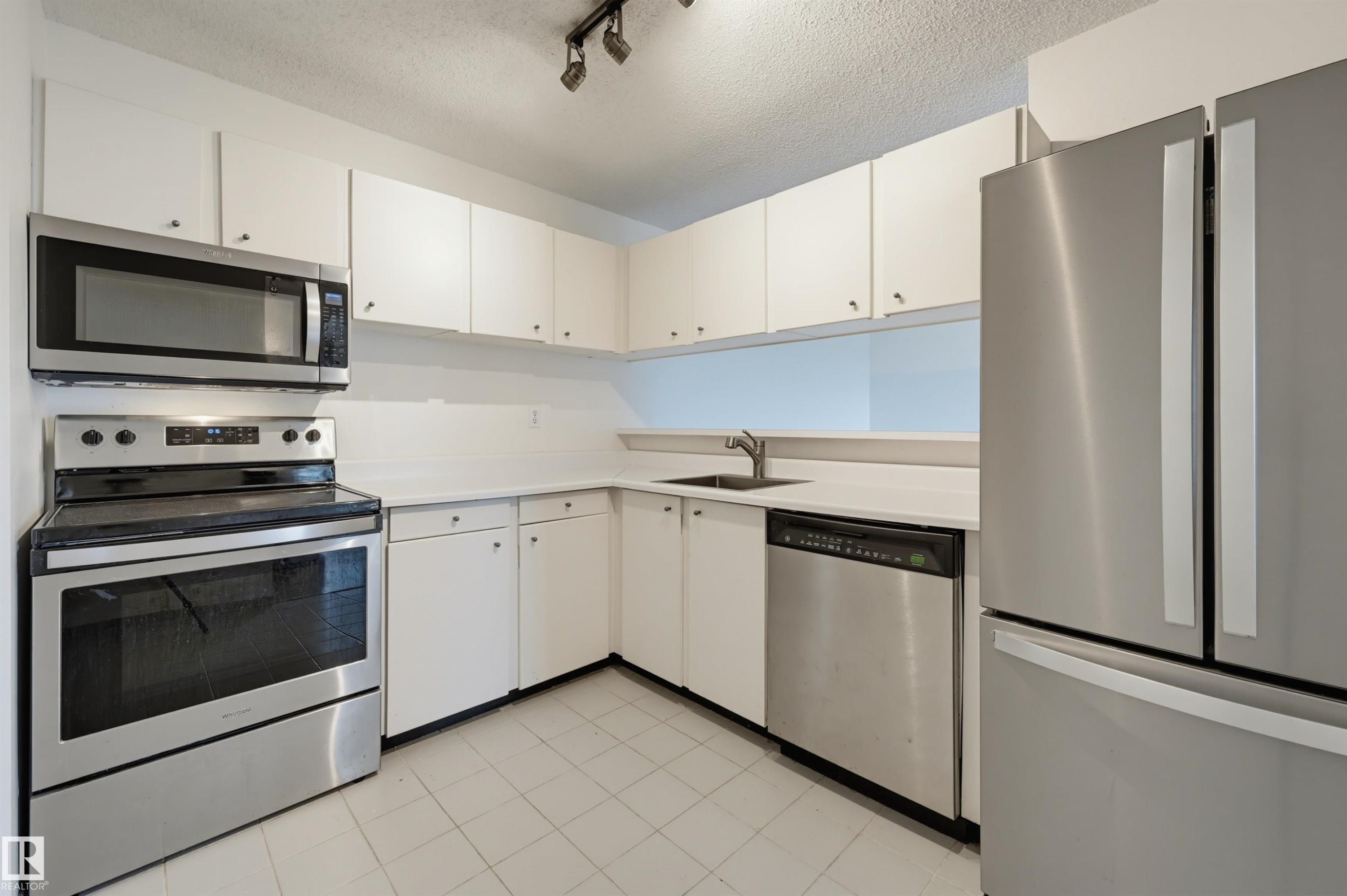 #502 10545 Saskatchewan Dr Nw, Edmonton, AB - Indoor Photo Showing Kitchen With Stainless Steel Kitchen