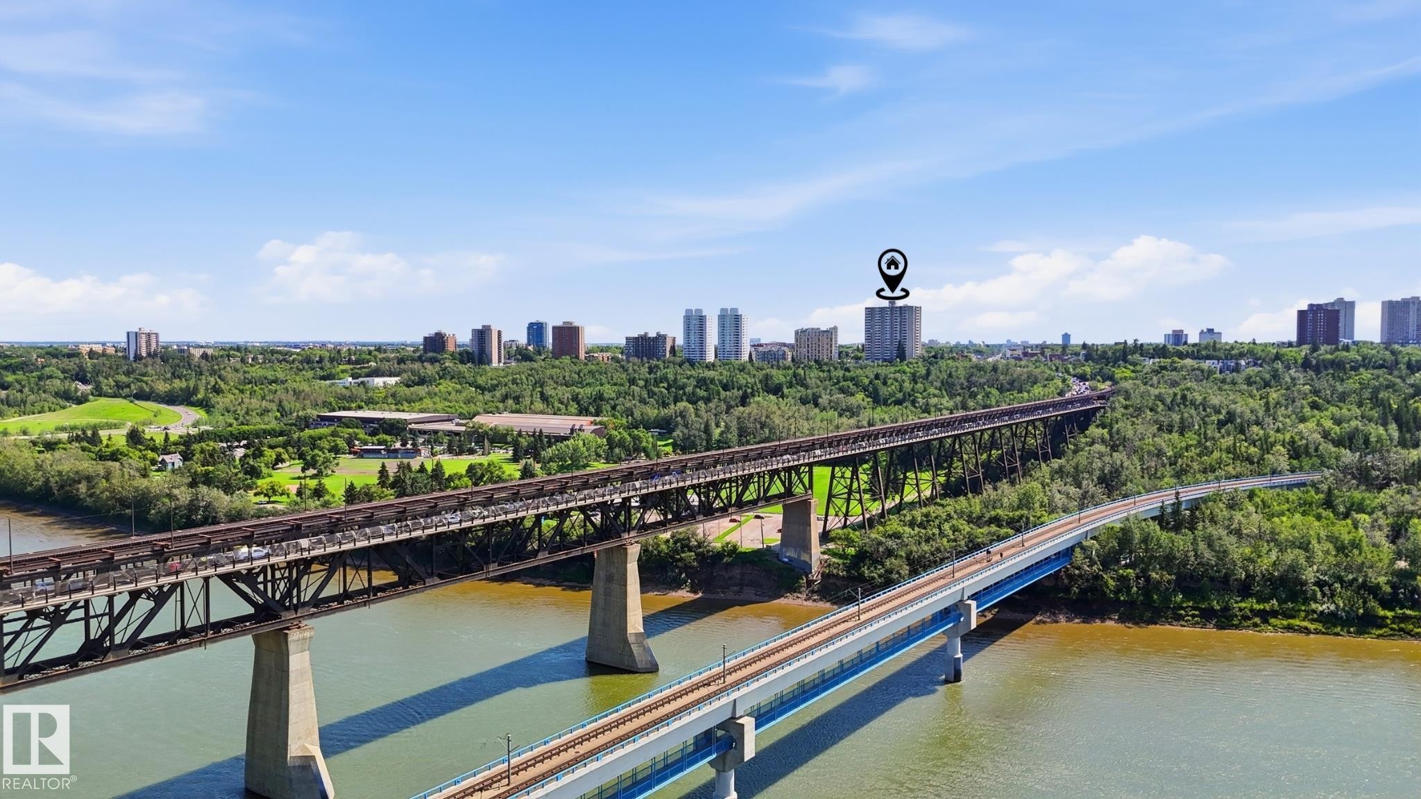 Waterfront property featuring extensive green spaces and urban skyline - #1508 10883 Saskatchewan Dr Nw Nw, Edmonton, AB - Outdoor With Balcony With View
